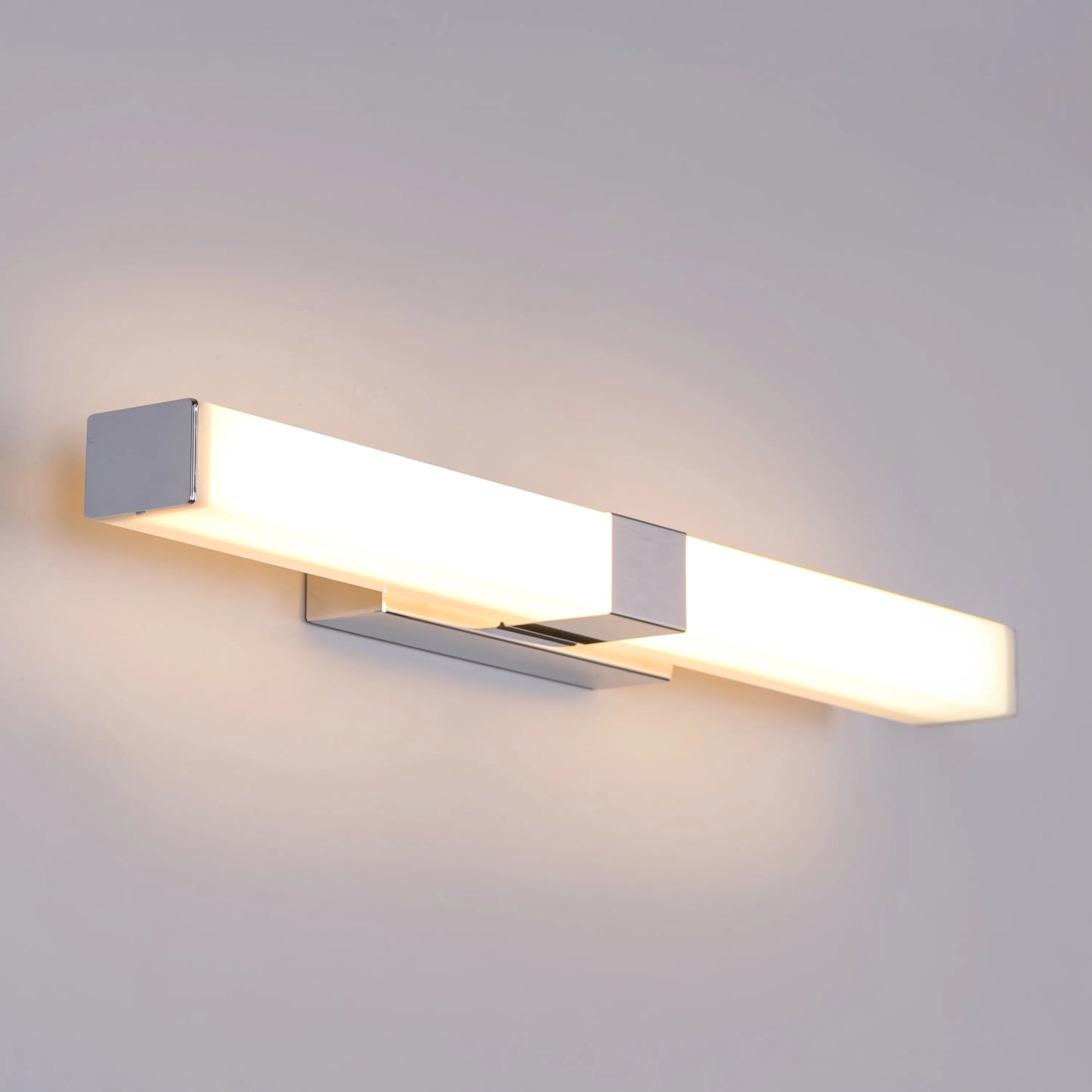 Vanity Reality Stainless Steel Vanity Light – a modern, polished stainless steel light fixture with energy-efficient LED illumination, perfect for bathrooms and dressing areas.