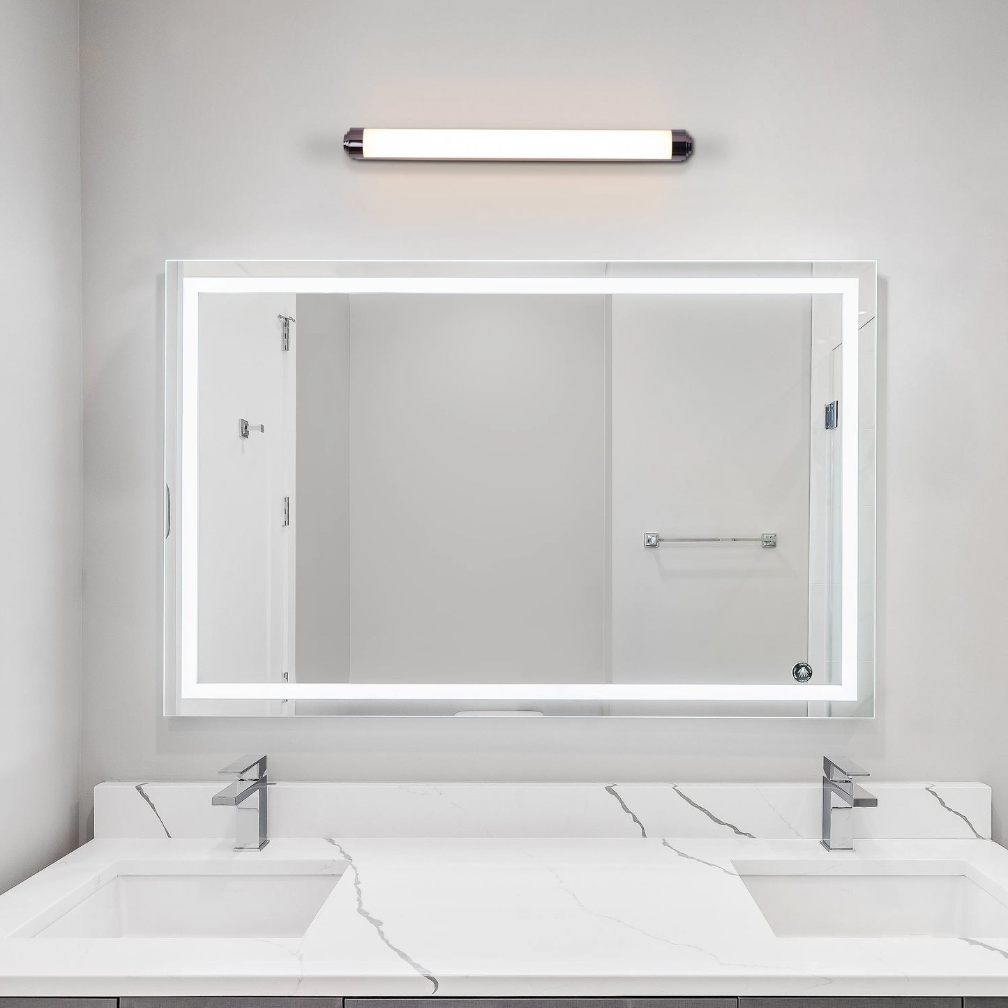 Vanity No More Stainless Steel Vanity Light – Modern stainless steel design with clear glass shades and energy-efficient LED lighting, perfect for bathroom or vanity spaces.