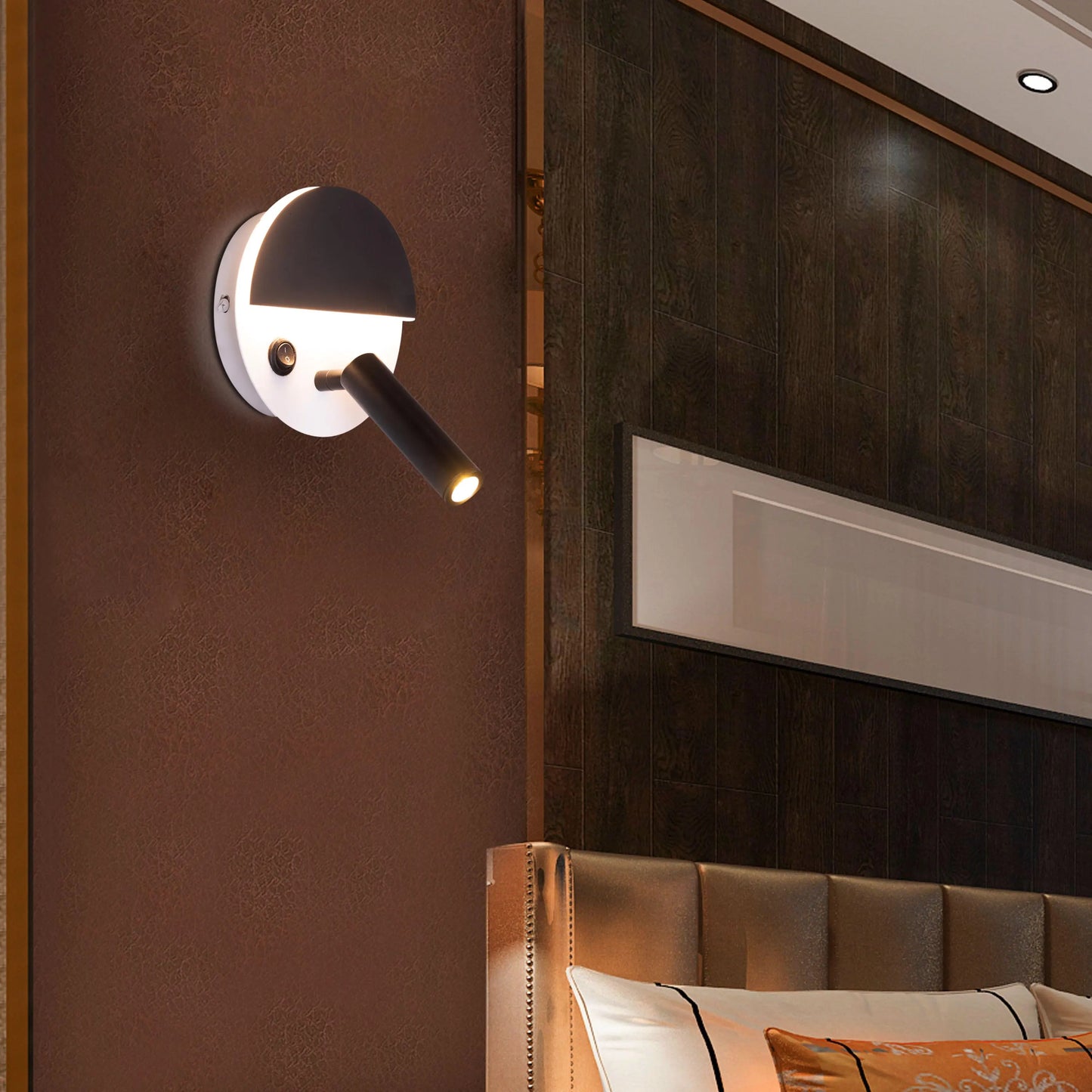 Elegant Elated Wall Light featuring a geometric layered design in brushed metal finish, projecting warm ambient light through crystal-clear glass elements against a neutral wall