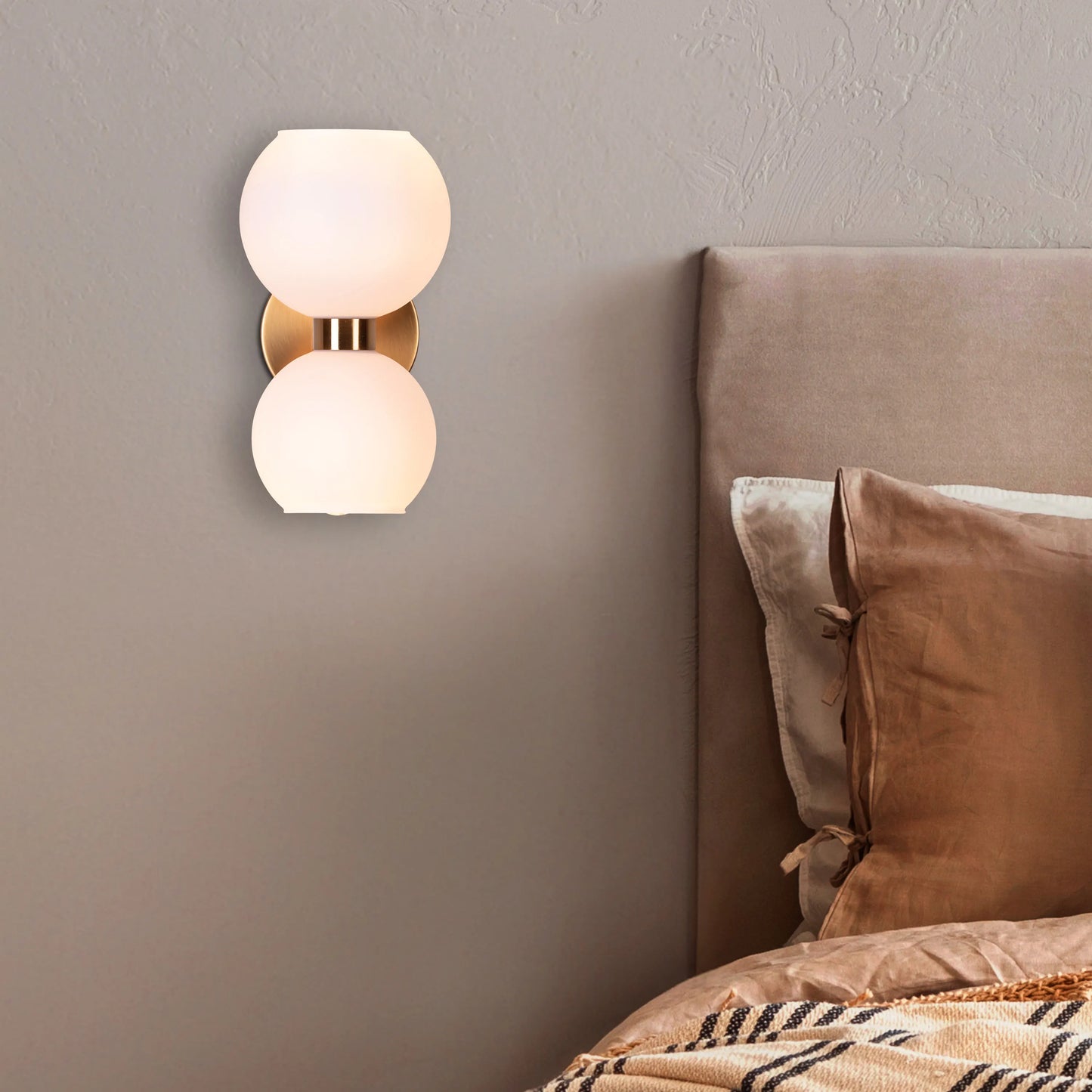 Afloat Wall Light - Captivating wall lighting fixture with a minimalist metal frame that appears to float effortlessly, supporting a soft, hazy glass diffuser that emits a warm and tranquil glow.