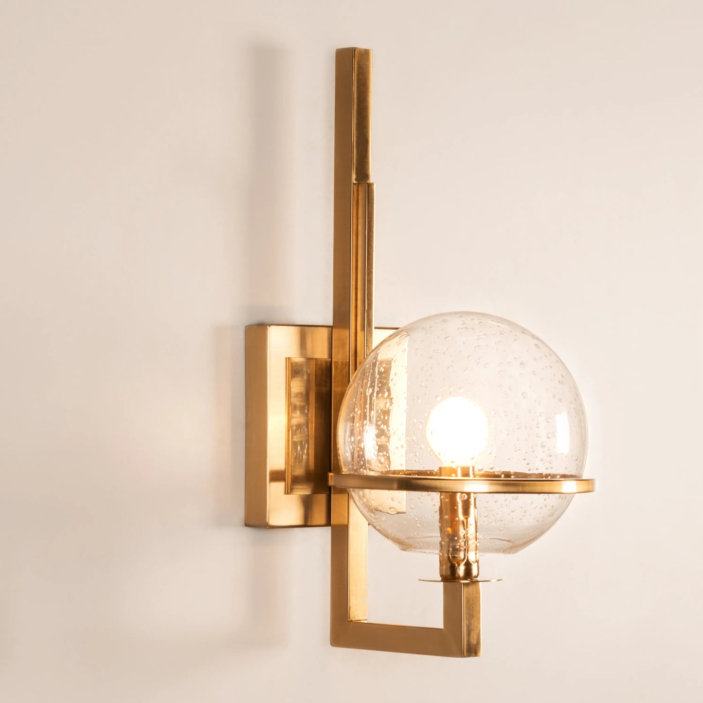 Game On Glass Wall Light – sleek modern wall light with reflective glass design and ambient glow, perfect for luxury interiors.