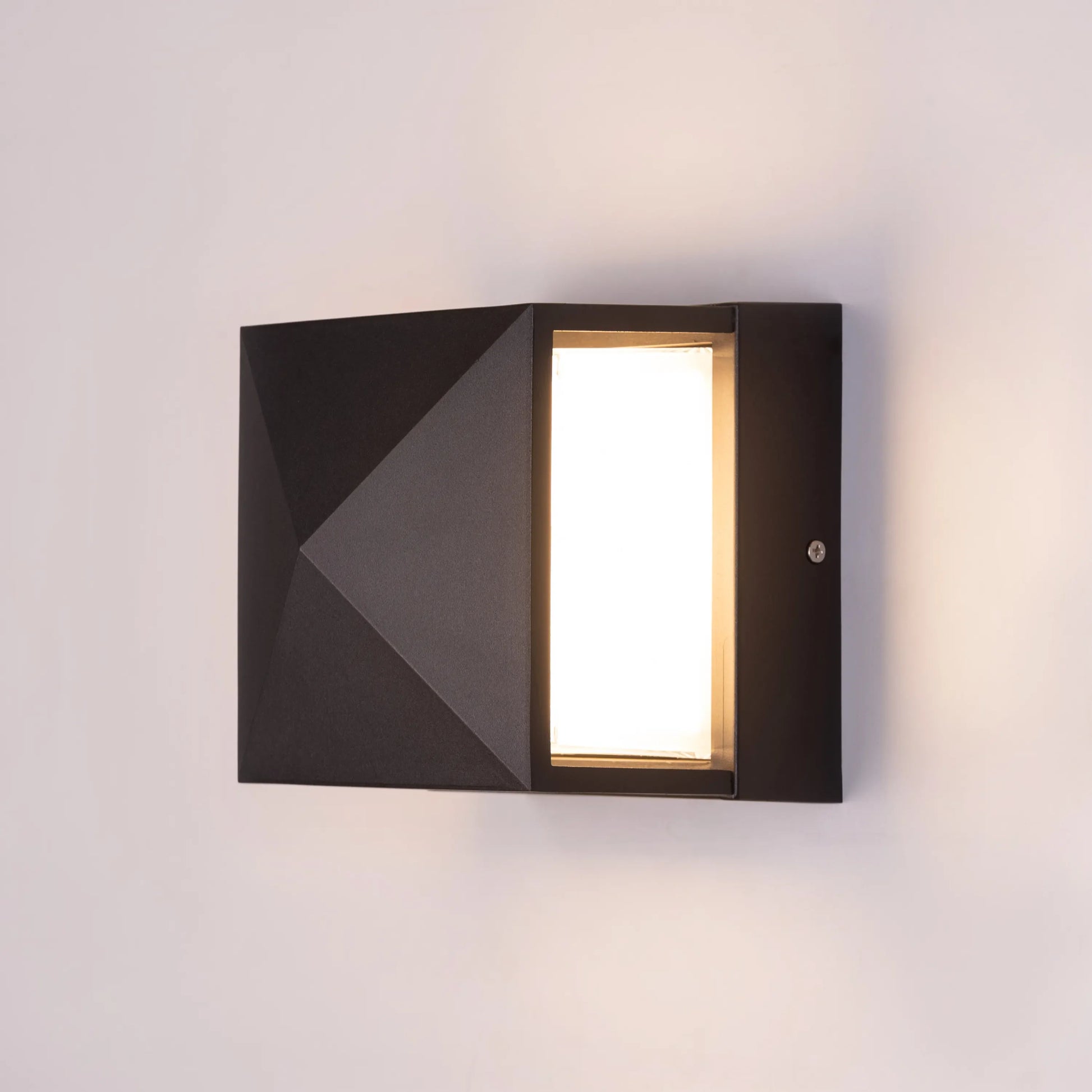 North Star Indoor/Outdoor Wall Light (IP65 Rated) – modern, weatherproof LED wall light with a celestial-inspired design for stylish illumination indoors or outdoors.