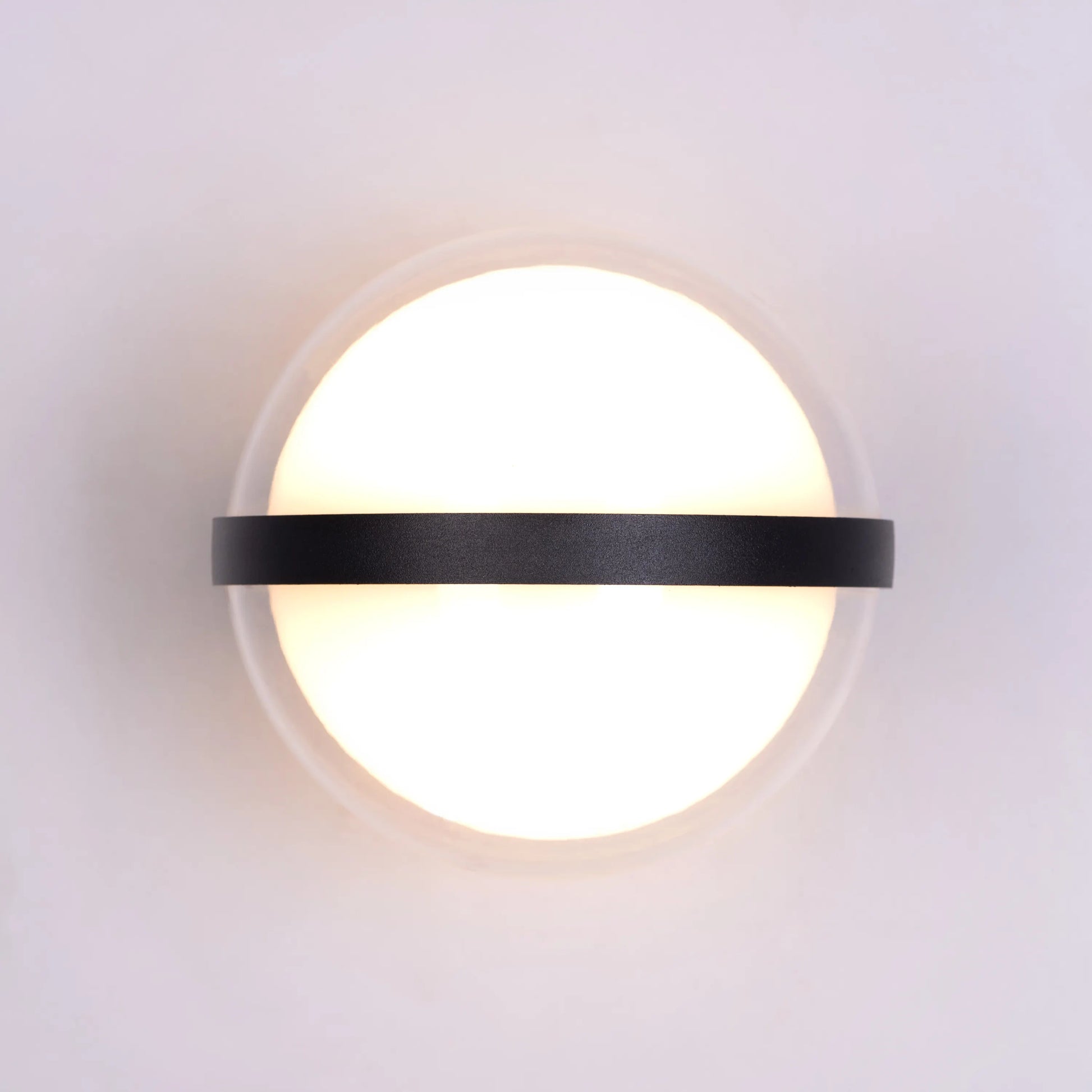 Loyal Indoor/Outdoor Wall Light – sleek and modern wall light with energy-efficient LED illumination, IP65 rated for weatherproof performance, perfect for both indoor and outdoor spaces.