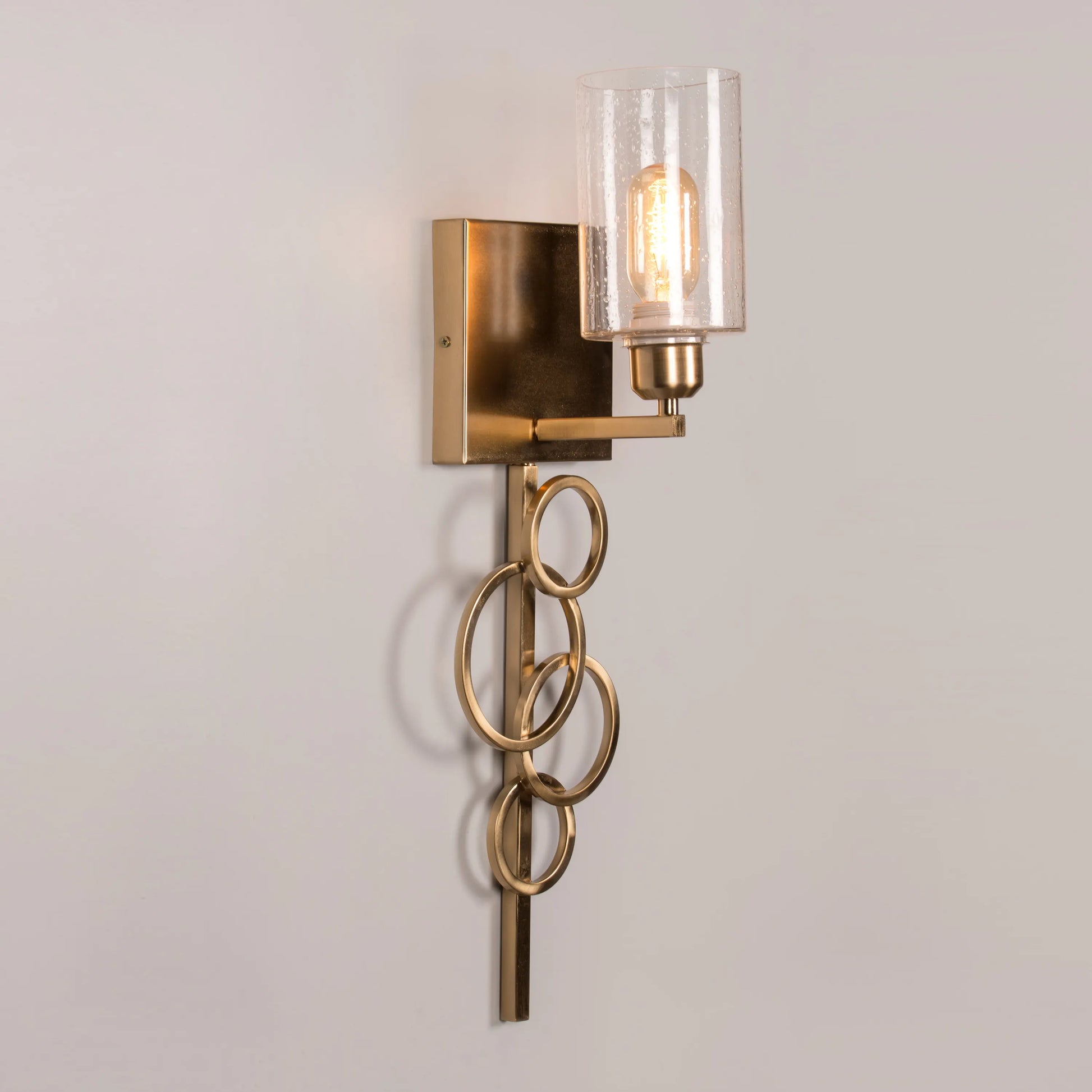 Ring Fling Glass Wall Light – modern, circular glass wall light with a soft ambient glow, ideal for luxury interiors.