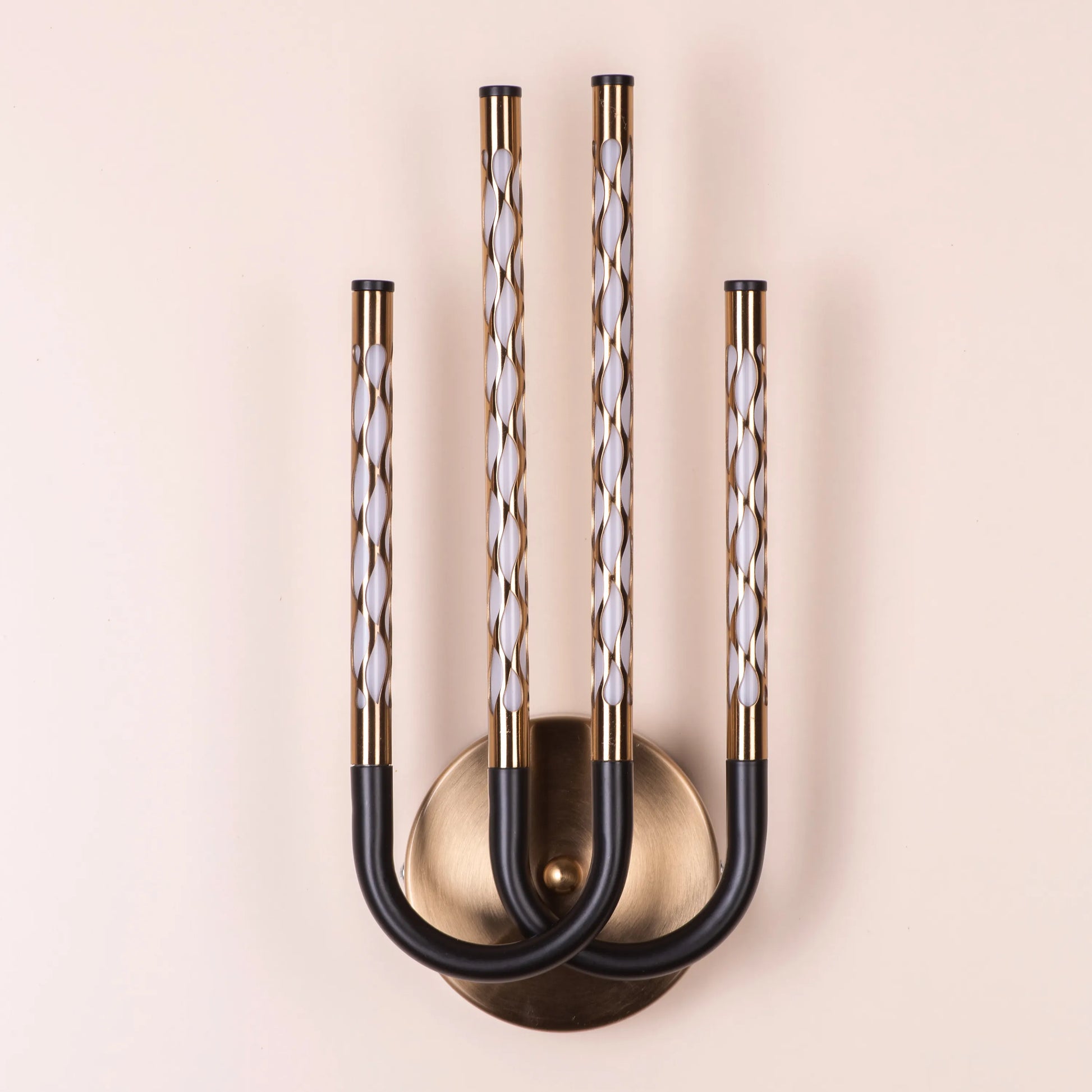 Tale To Tell Wall Light – elegant, artfully designed wall light that provides soft, ambient lighting, perfect for creating a cozy atmosphere in any room.