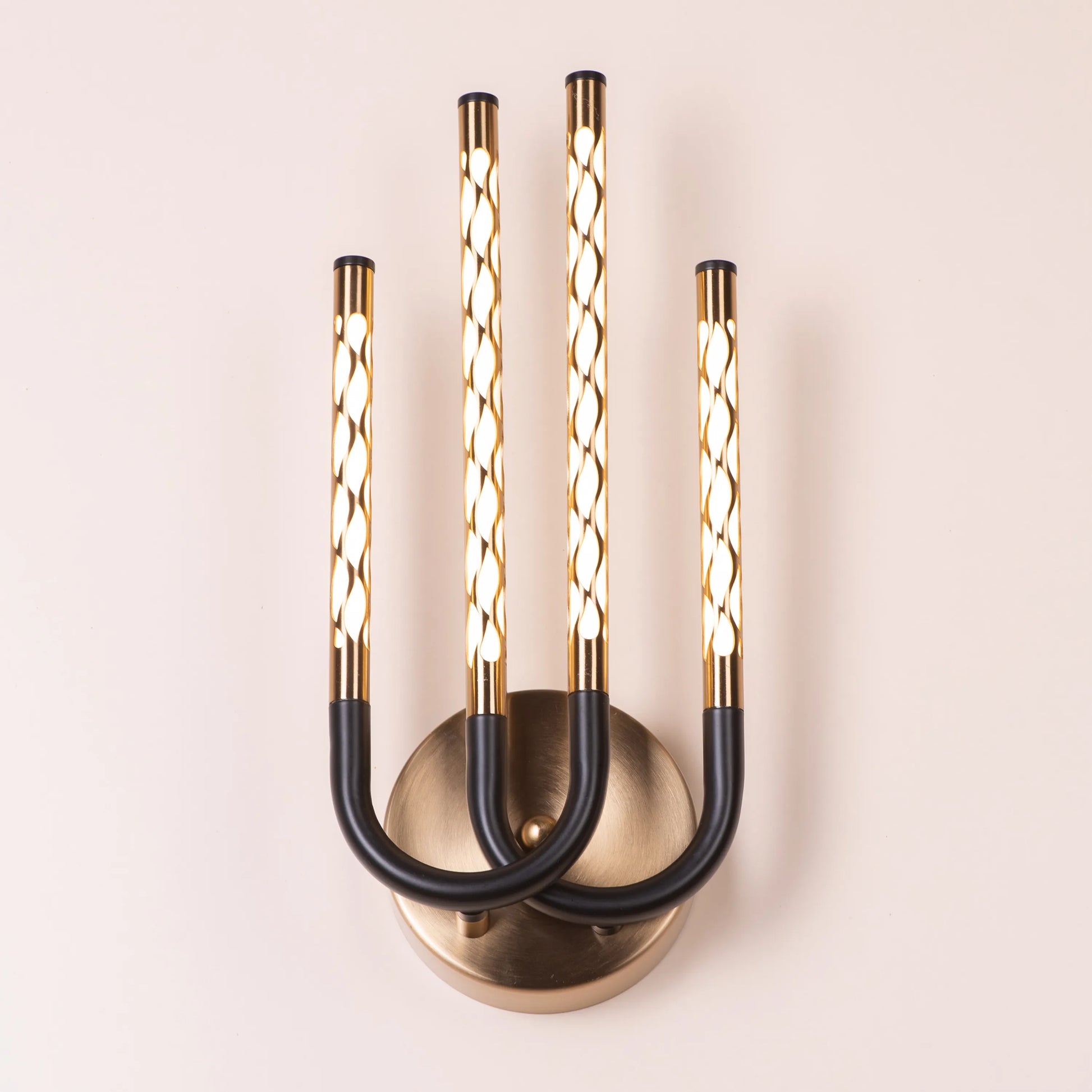 Tale To Tell Wall Light – elegant, artfully designed wall light that provides soft, ambient lighting, perfect for creating a cozy atmosphere in any room.