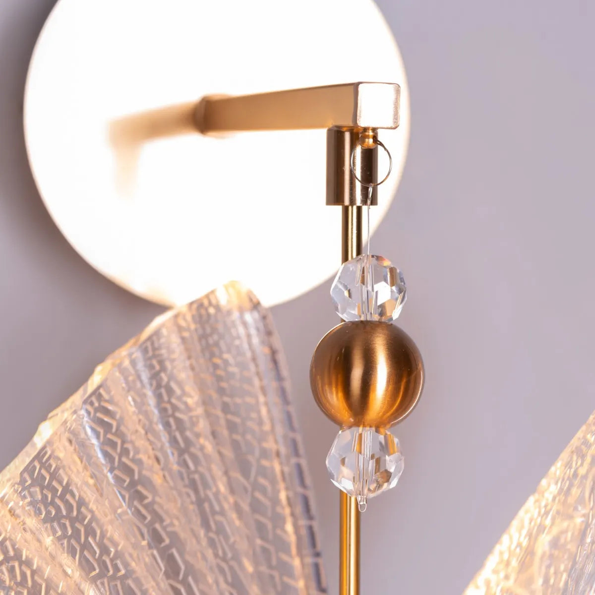 Butterfly Wishes Wall Light - Enchanting and whimsical wall lighting fixture featuring delicate metal cutouts that resemble a graceful butterfly in flight, casting a mesmerizing play of light and shadow.