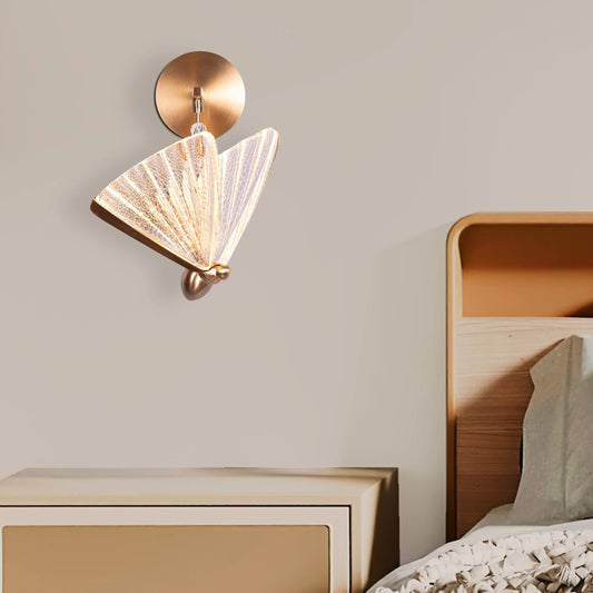 Butterfly Wishes Wall Light - Enchanting and whimsical wall lighting fixture featuring delicate metal cutouts that resemble a graceful butterfly in flight, casting a mesmerizing play of light and shadow.