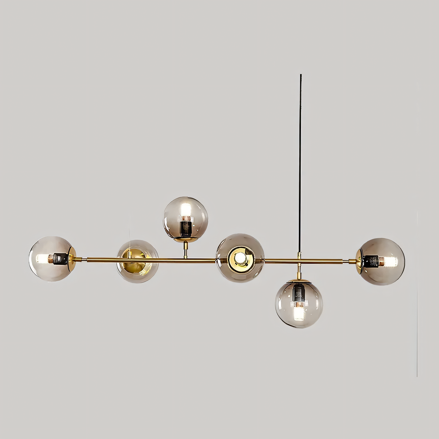 Rich, bronze-finished metal body of the Previcacious Chandelier