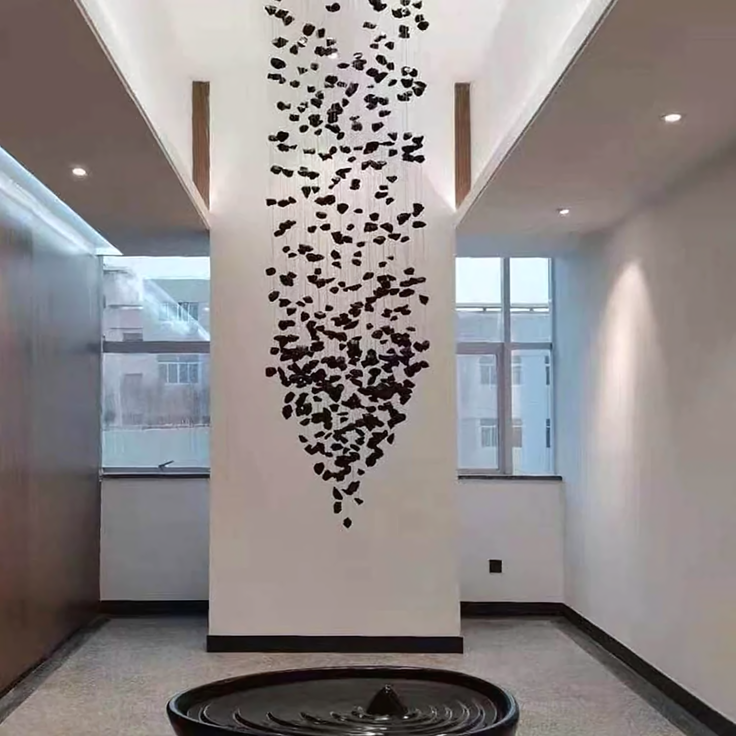 Impressive scale and size of the Falling Star Chandelier, a focal point