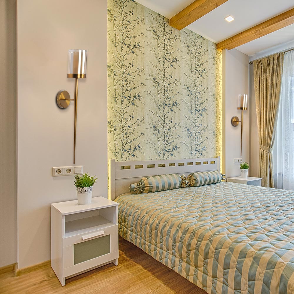 Exquisite golden wall sconce with intricate etchings