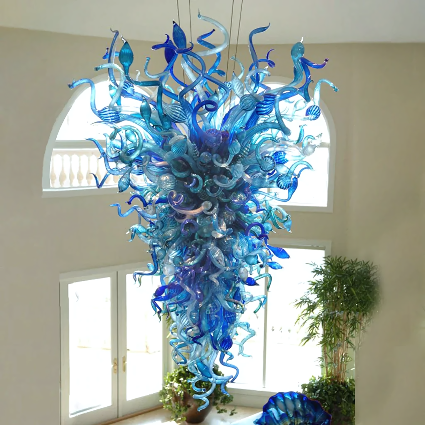 Chihuly Inspired Chandelier, a captivating centerpiece that evokes winter's beauty