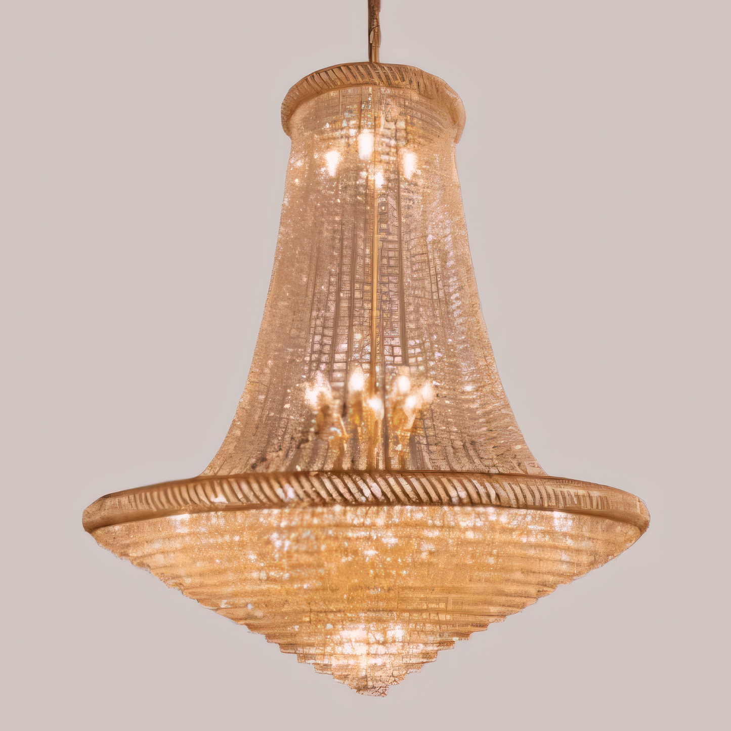 Intricate metal framework and cascading crystal droplets of the chandelier