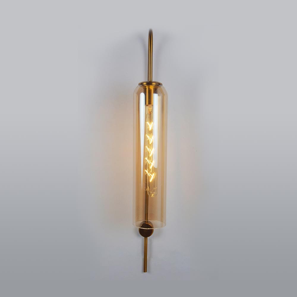 Gold-toned metal wall fixture, flickering flames, echoes of the past.