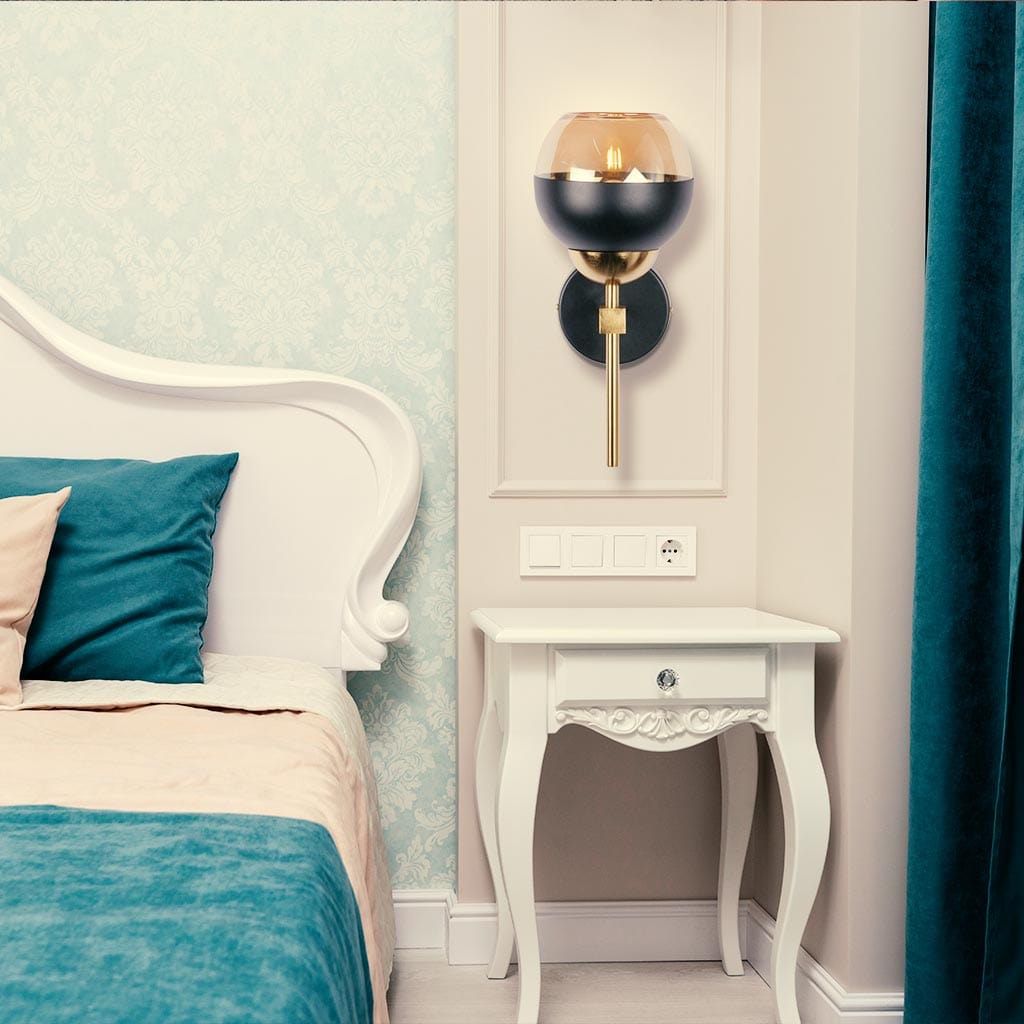 Intricate metalwork wall light design