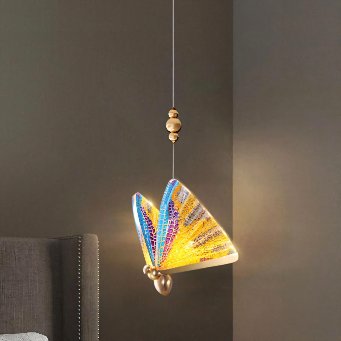 Vibrant and captivating hanging light fixture with a butterfly design