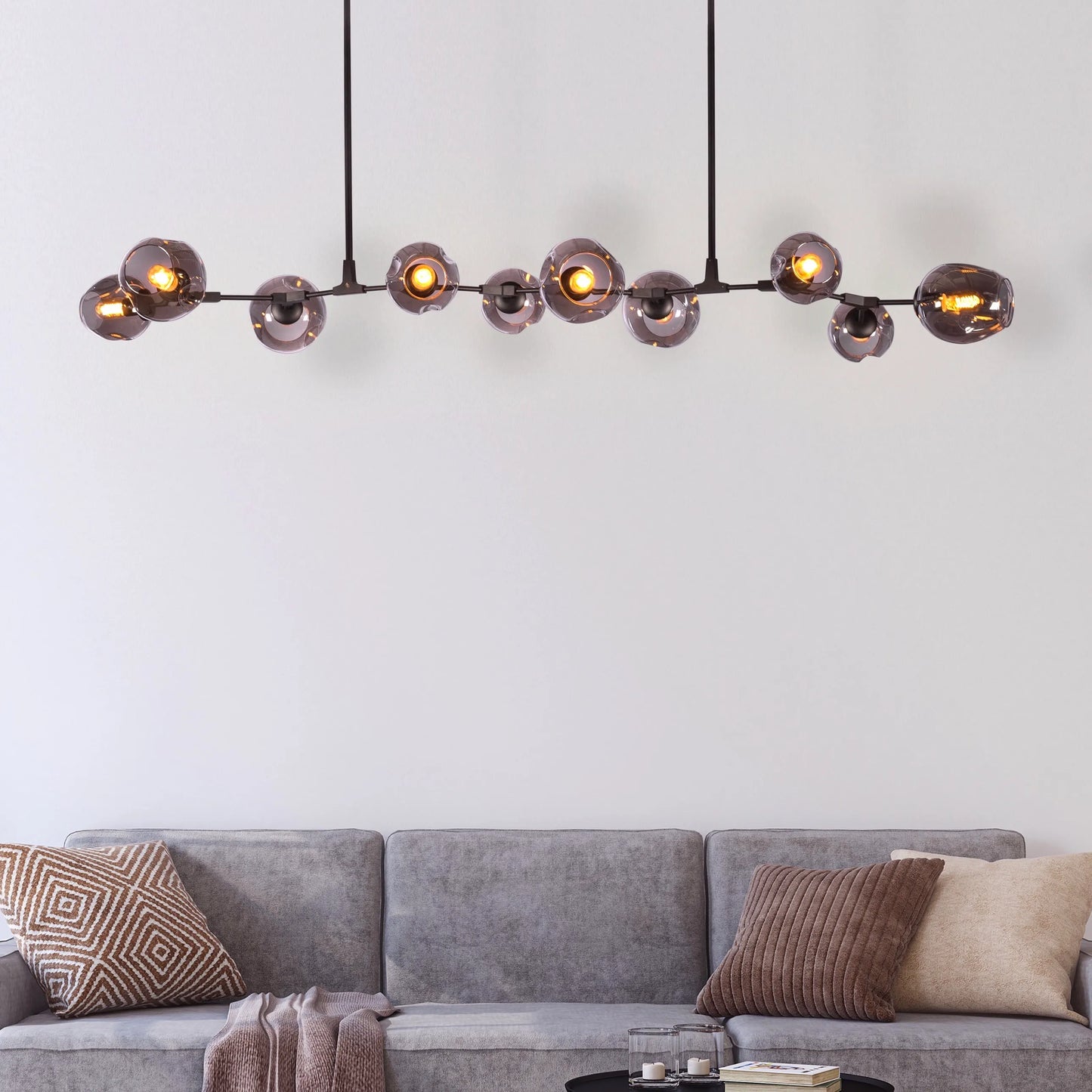 Games People Play (Large, Black, Smokey Grey) Glass Chandelier illuminating a stylish dining room