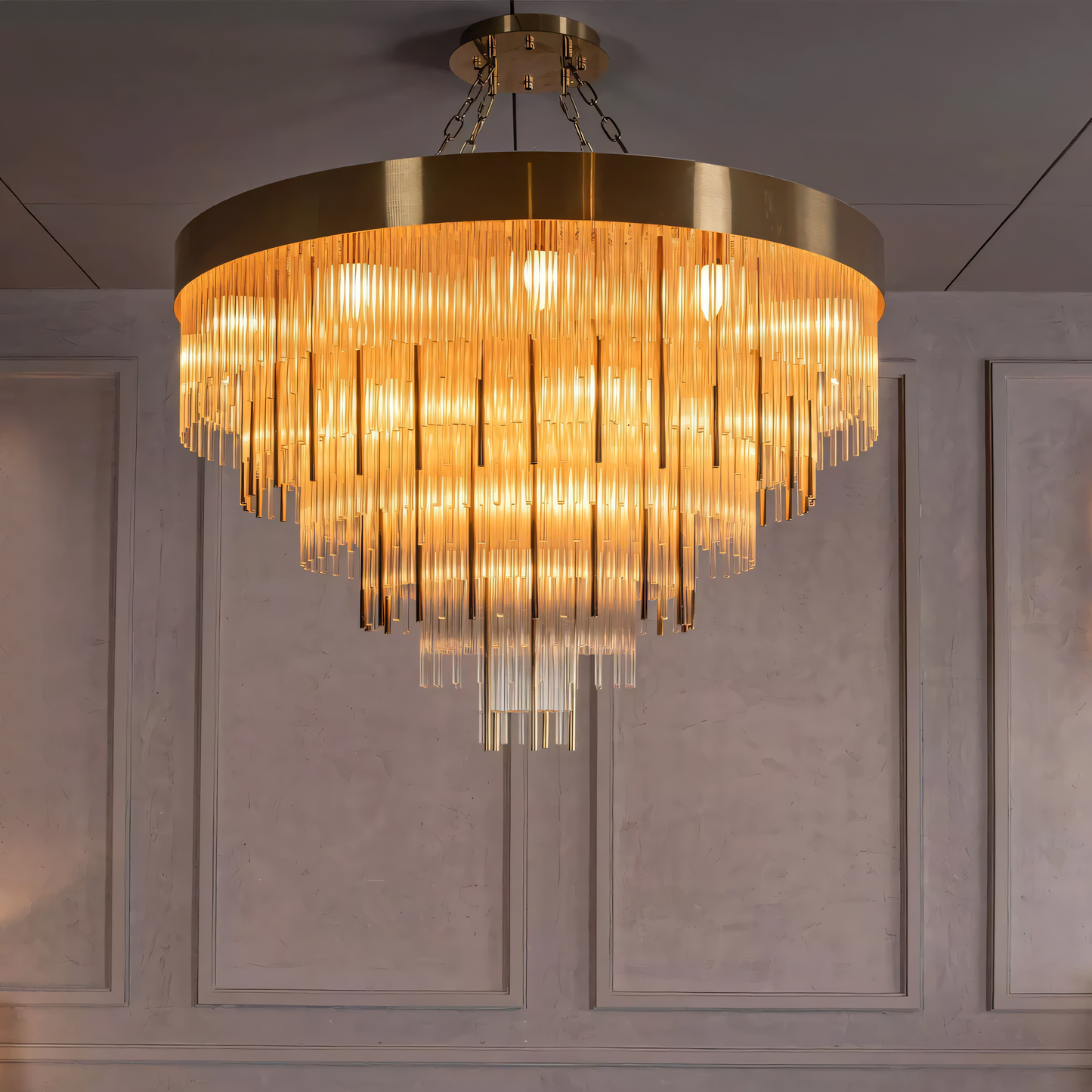 Intricate metal framework and cascading crystal droplets of the chandelier