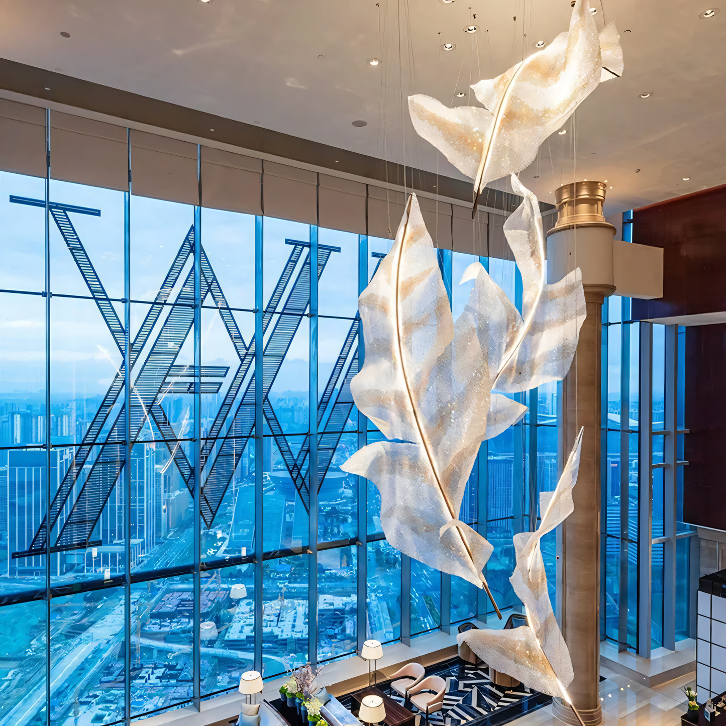 Delicate, hand-woven raffia fronds on the Raffia Orbifolia Radiance Pendant