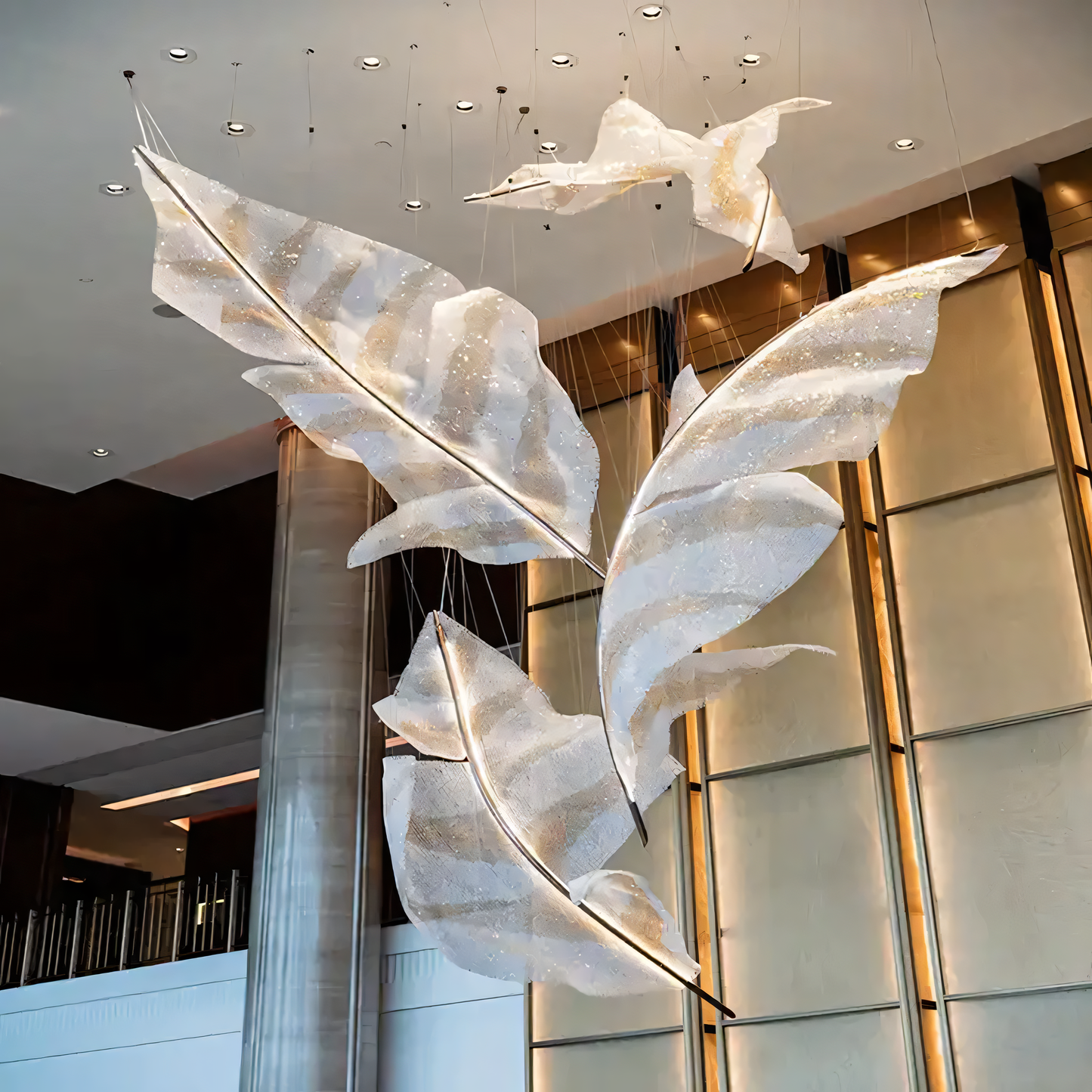 Organic, natural design of the Raffia Orbifolia Radiance Pendant