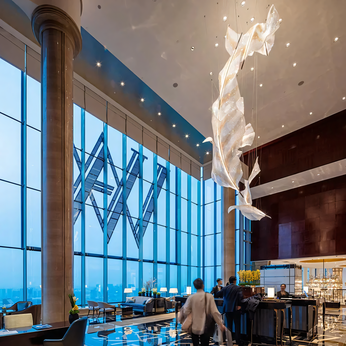 Mesmerizing play of light and movement from the Raffia Orbifolia Radiance Pendant