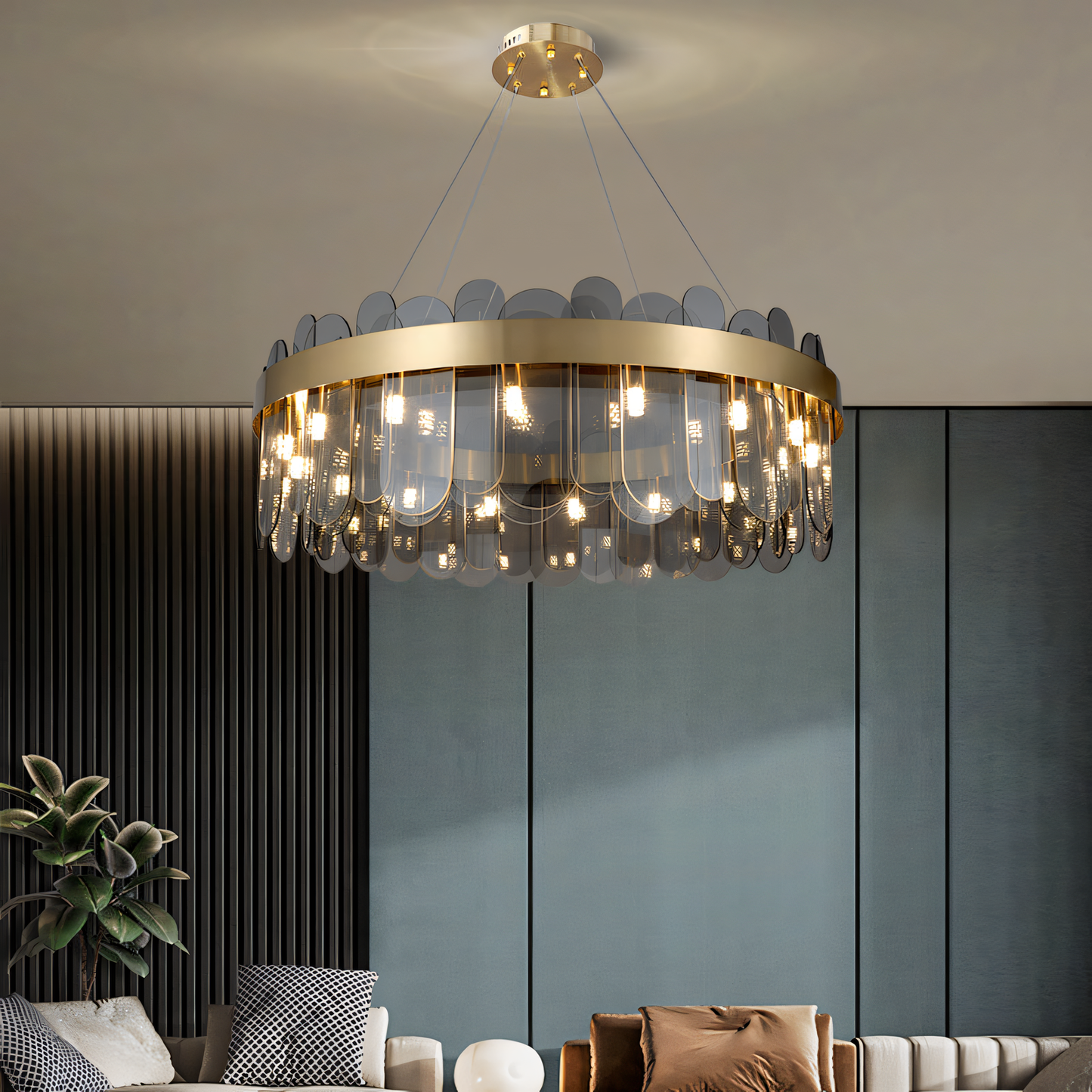 Unlike traditional chandeliers, this modern design features smokey glass panels that diffuse light for a soft and inviting ambiance.