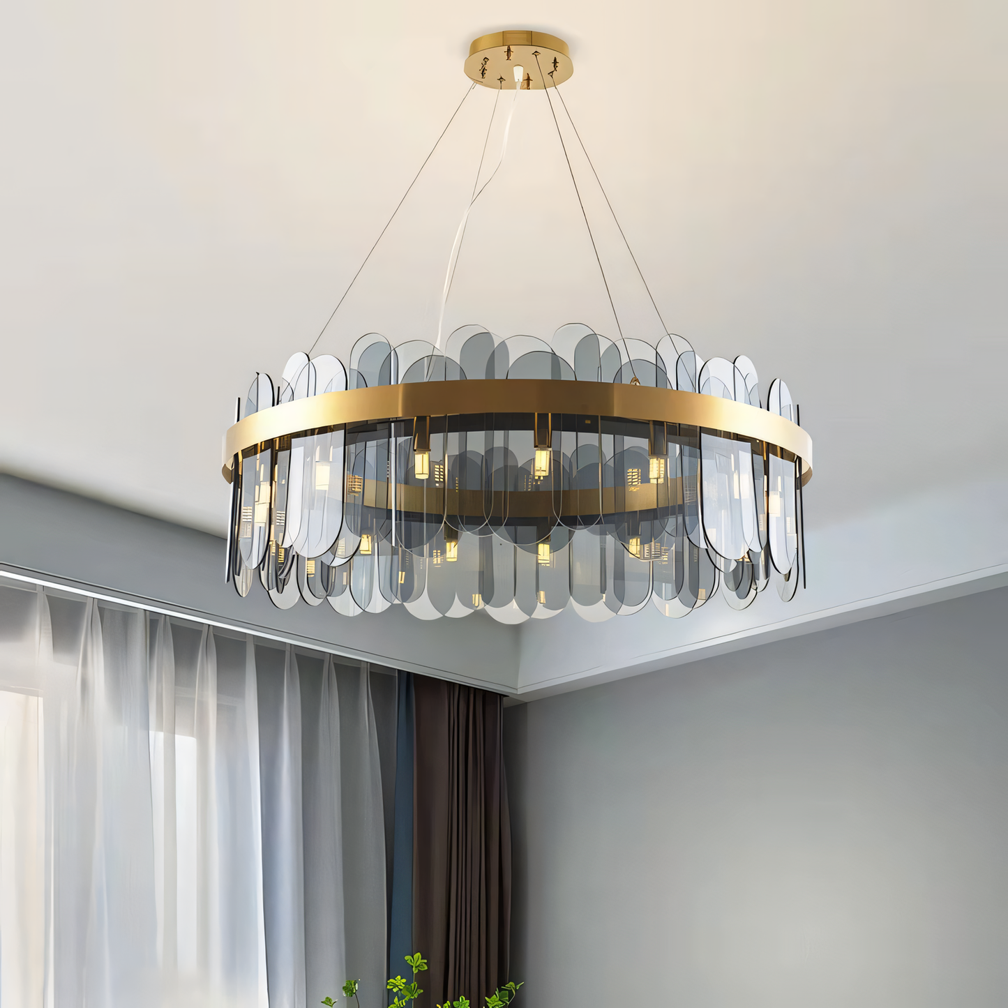 Upgrade your home décor with a touch of modern luxury. This 600mm Brass Chandelier with Smokey Glass boasts a warm glow and captivating play of light.