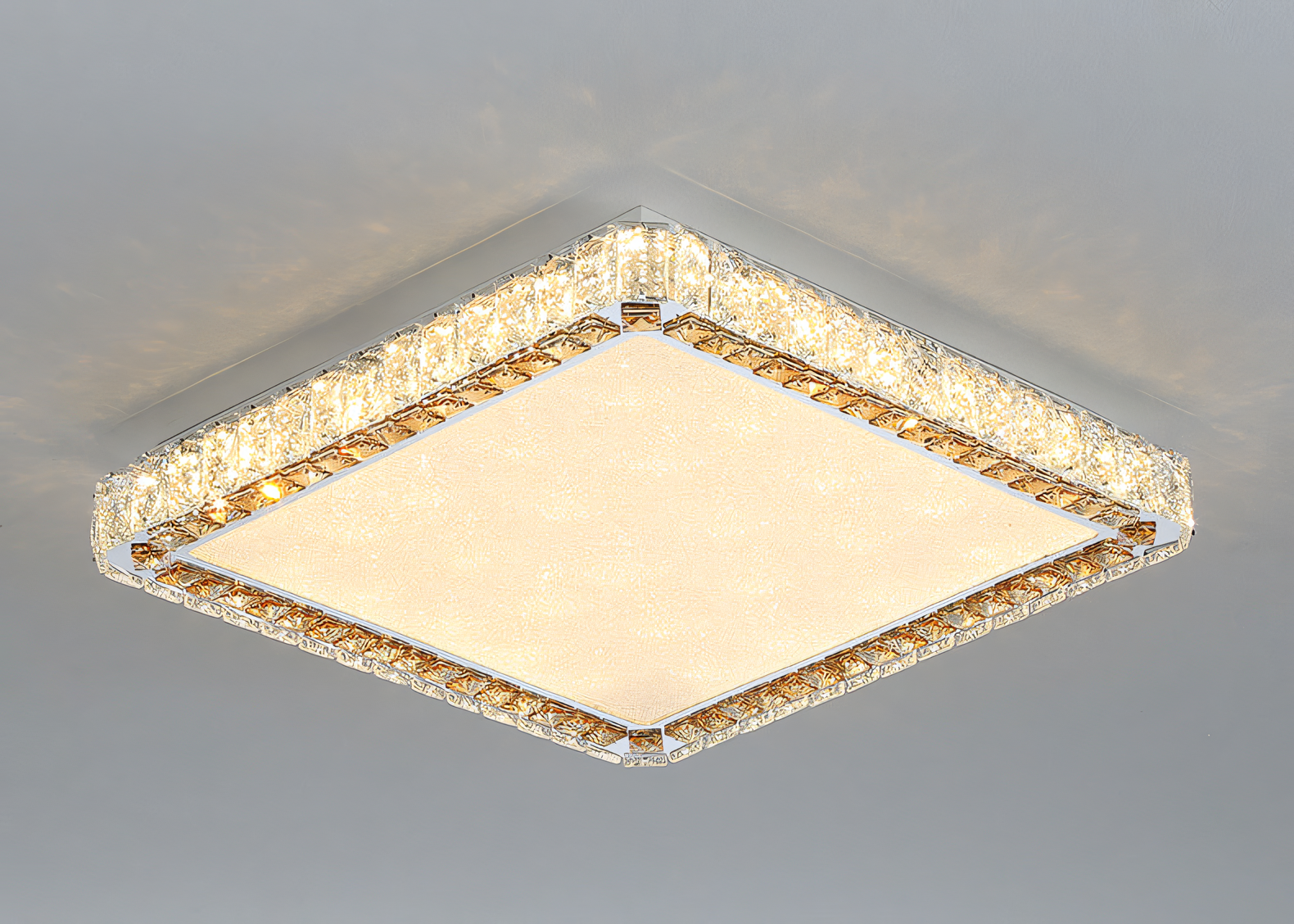This elegant chandelier features a polished gold square frame adorned with sparkling crystals, creating a warm and inviting ambiance.