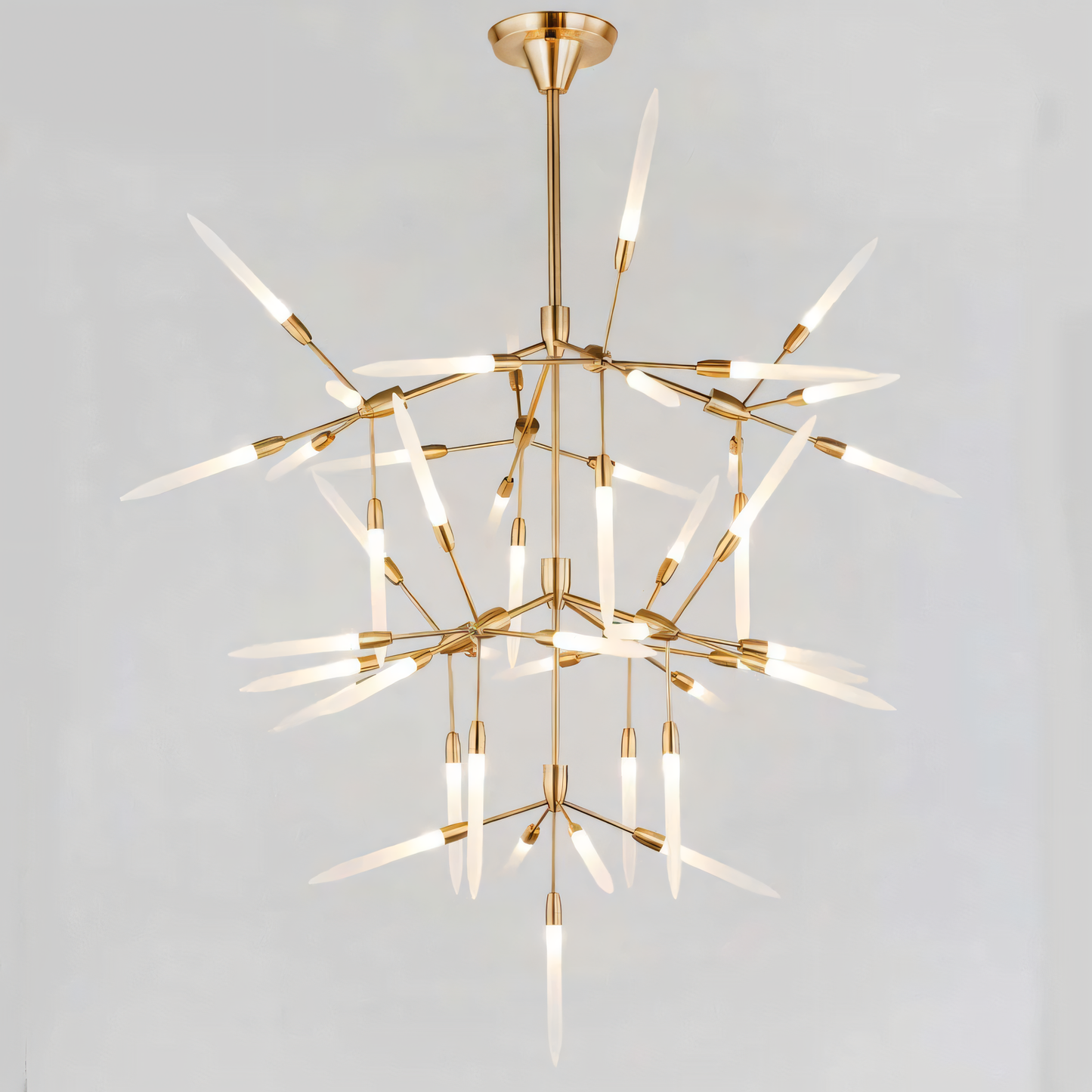 Sleek golden chandelier with mesmerizing frosted glass spikes