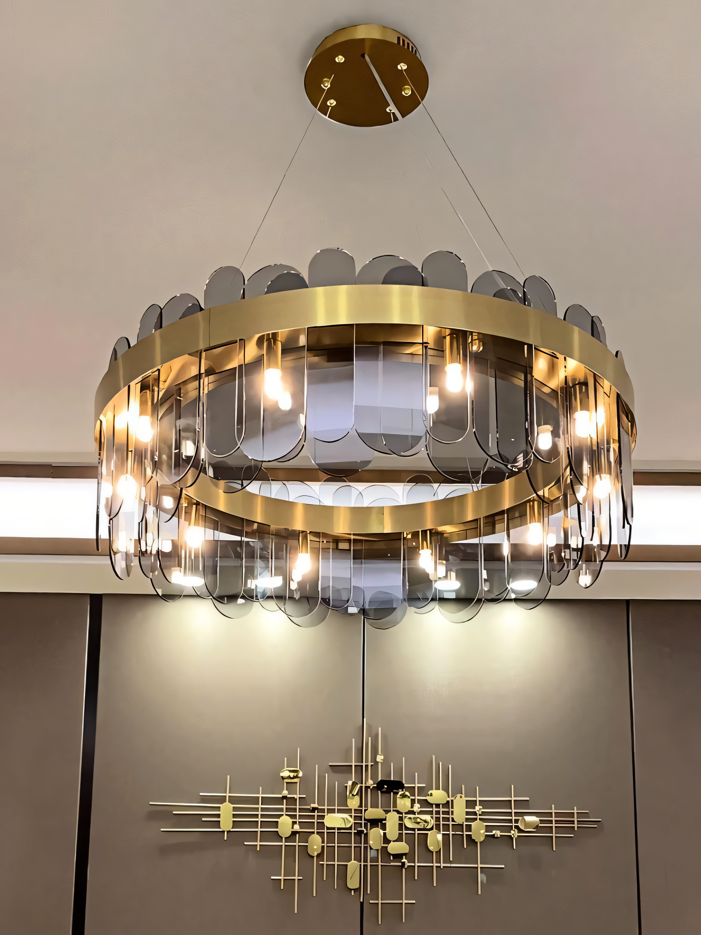 This LED chandelier is more than just a light fixture; it's a conversation starter. The smokey glass and gold frame create a unique and captivating design.