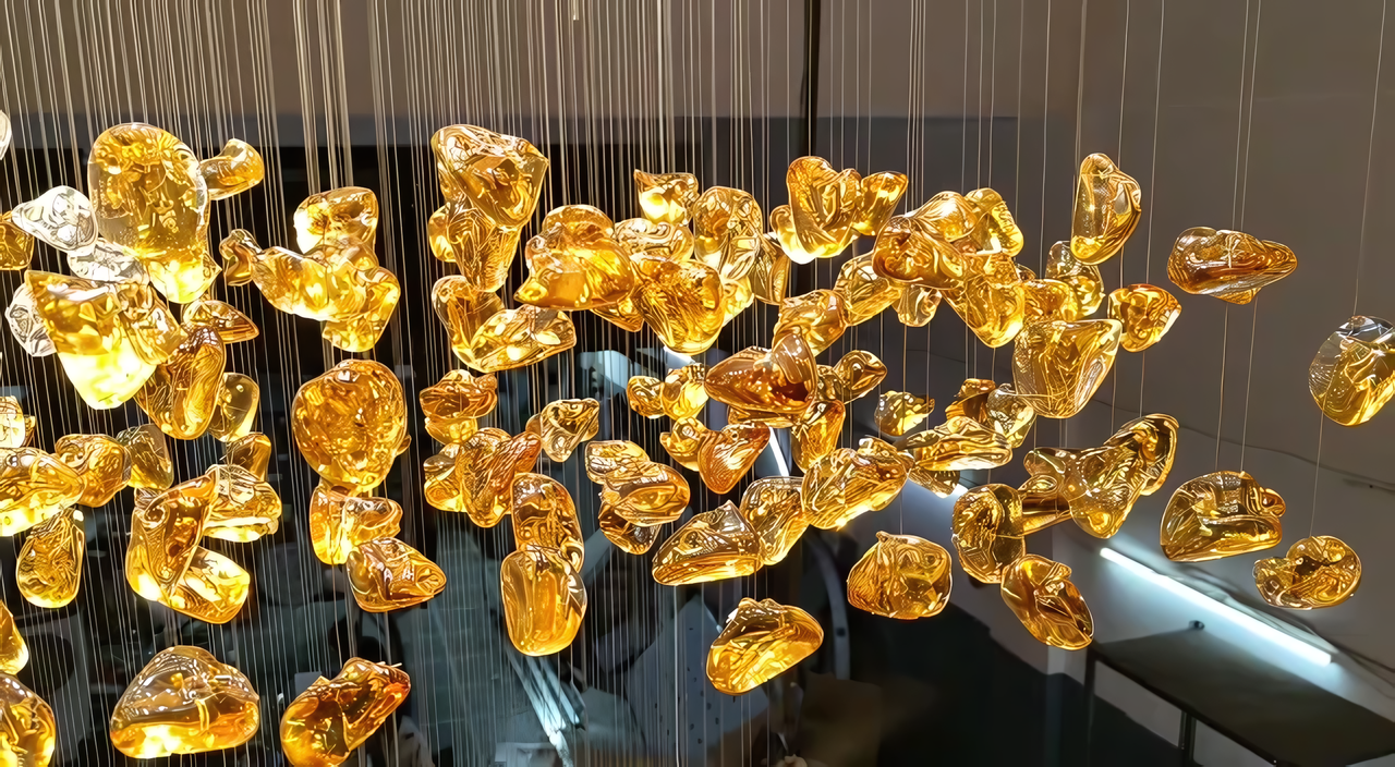 Hundreds of sparkling crystal drops on the Falling Star Chandelier