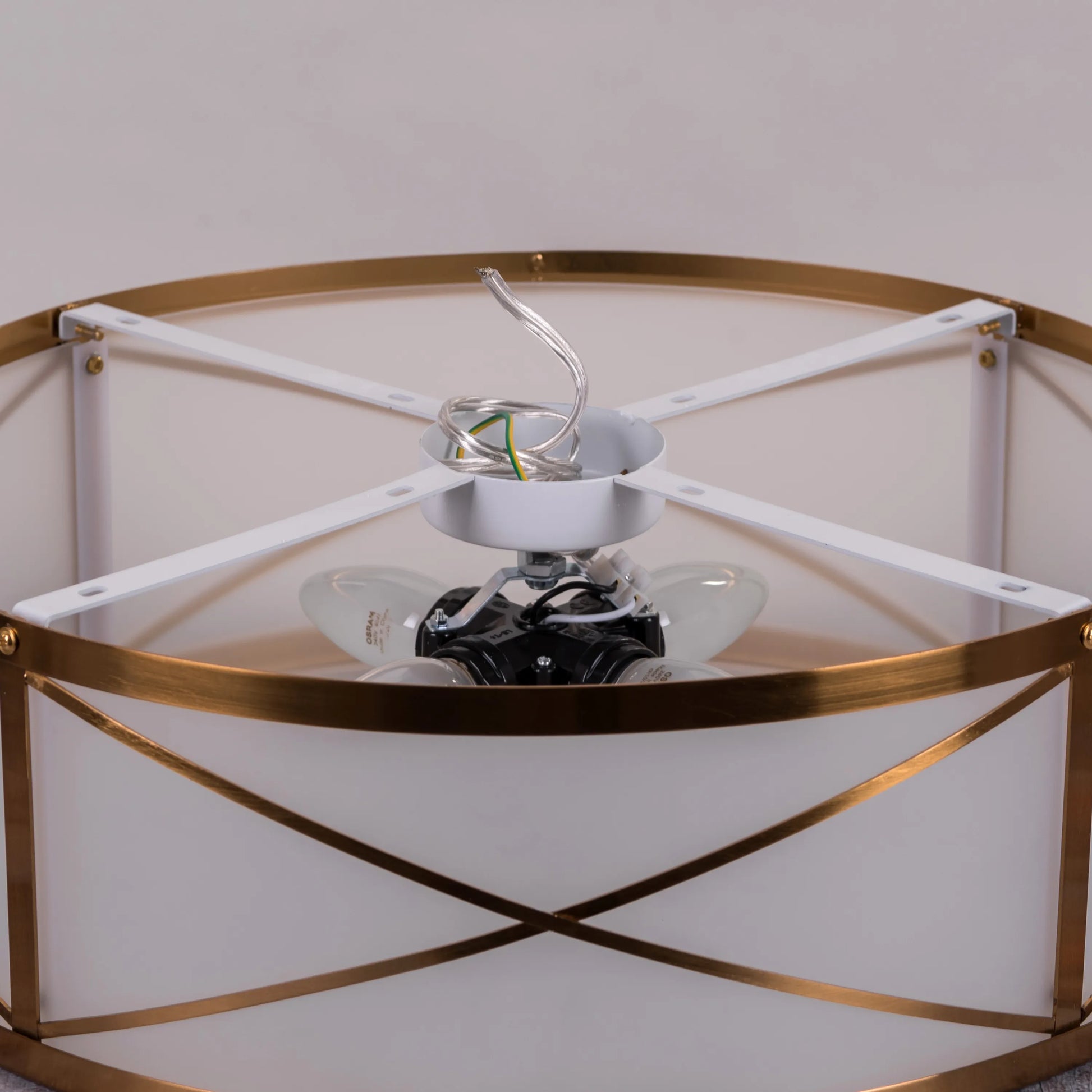 Wish You Well ceiling light with a radiant gold finish.