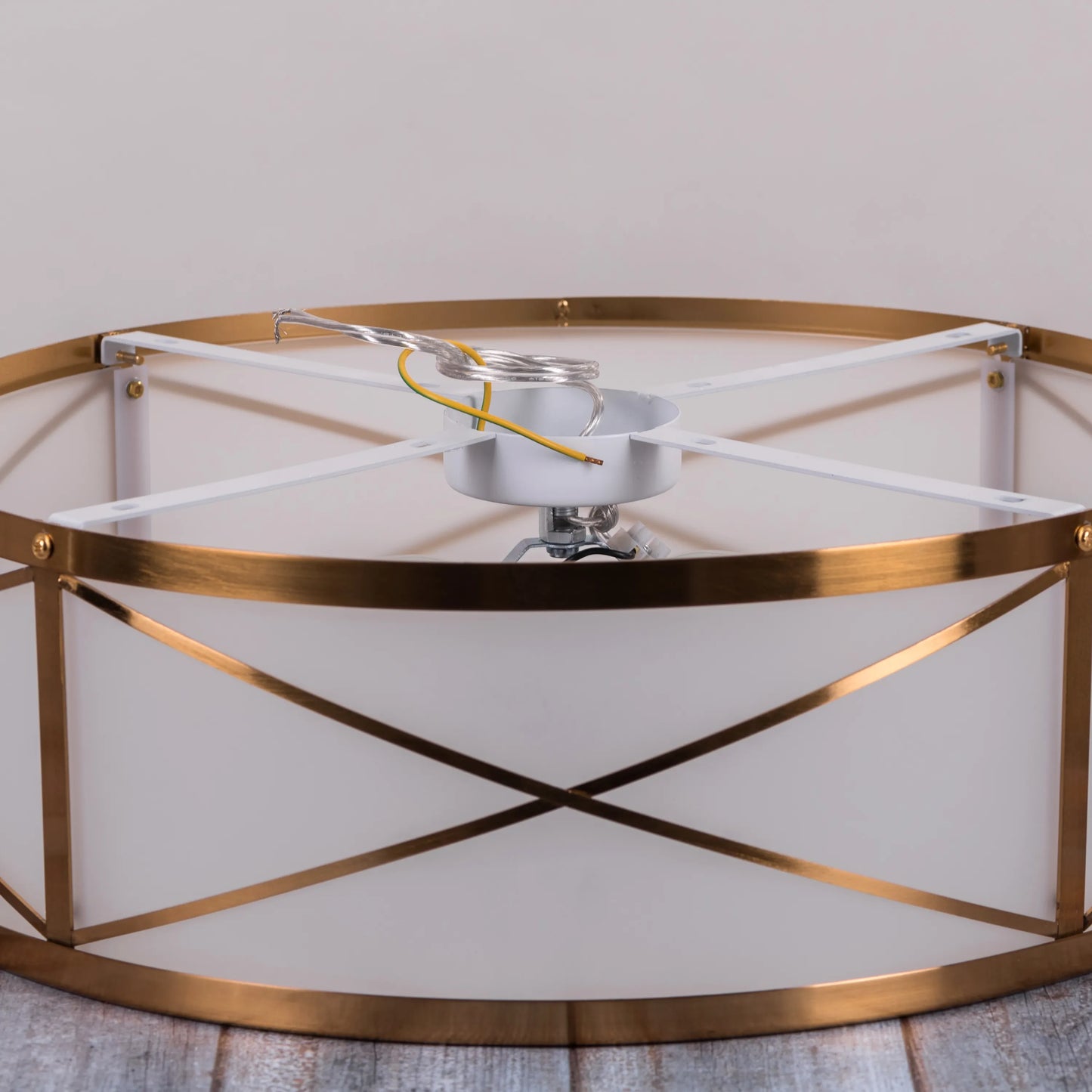 Elegant ceiling light with luxurious gold accents.