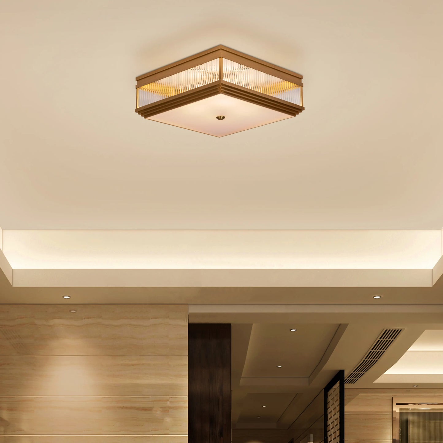 Live & Learn Gold Ceiling Light casting a warm glow in an elegant living room