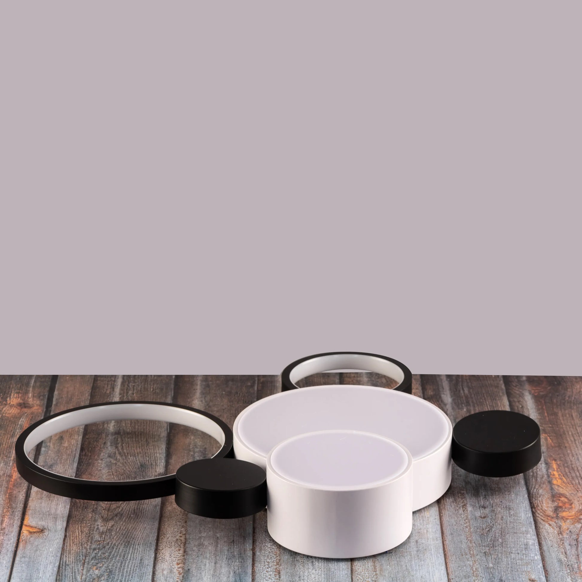 Medium-sized Heat Wave LED ceiling light brightening a cozy bedroom