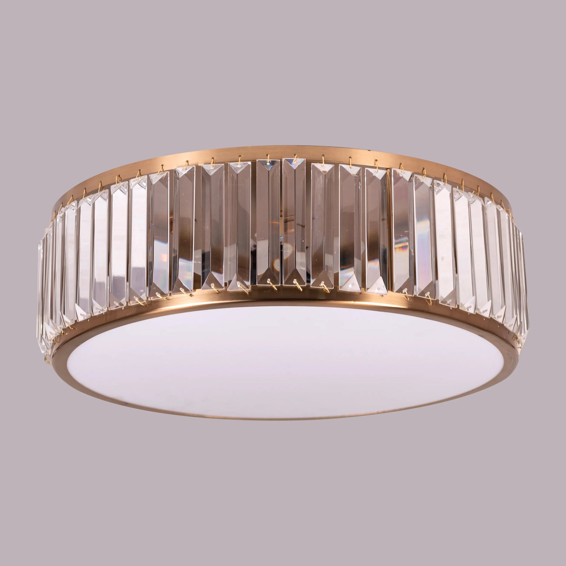 Matinee Gold Crystal Ceiling Light featuring cascading crystal droplets suspended from a circular gold frame, creating a luxurious and sparkling illumination for elegant spaces.