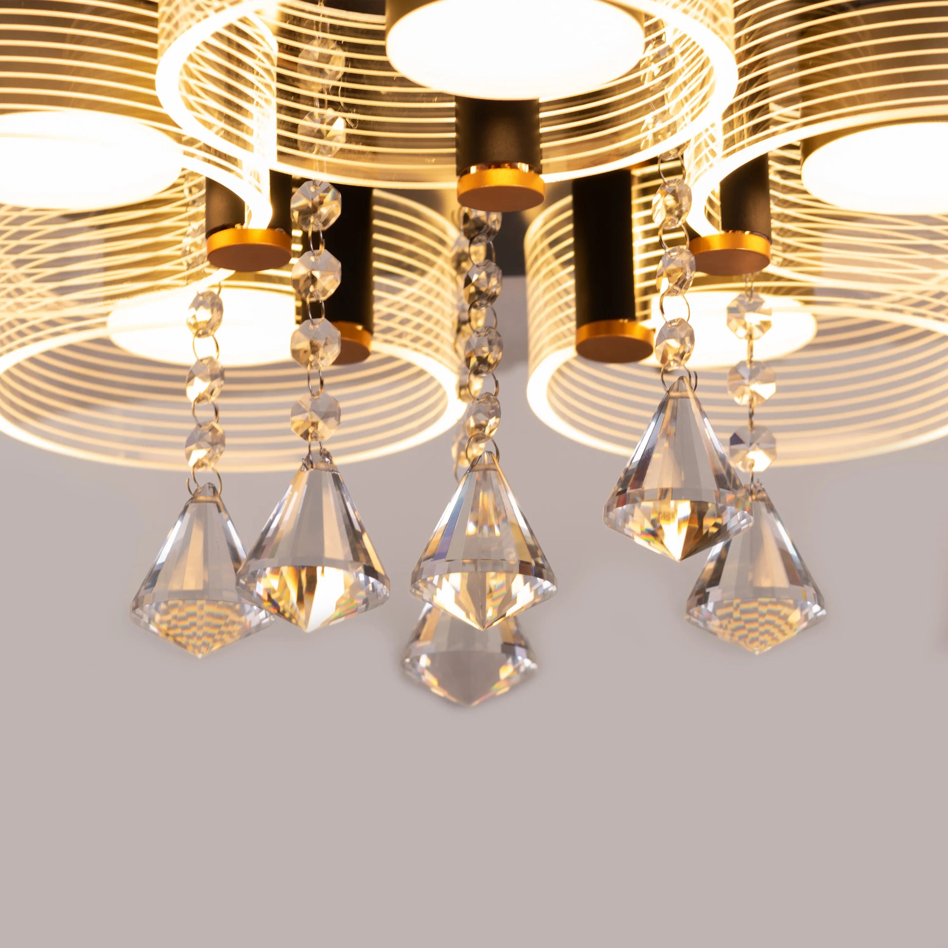Elegant gold and crystal ceiling light with LED.