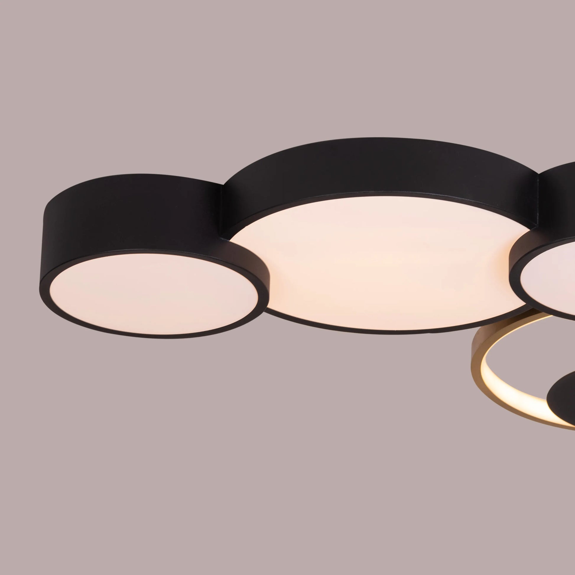 Redirected Black Ceiling Light showcasing its sleek matte finish in a modern living room