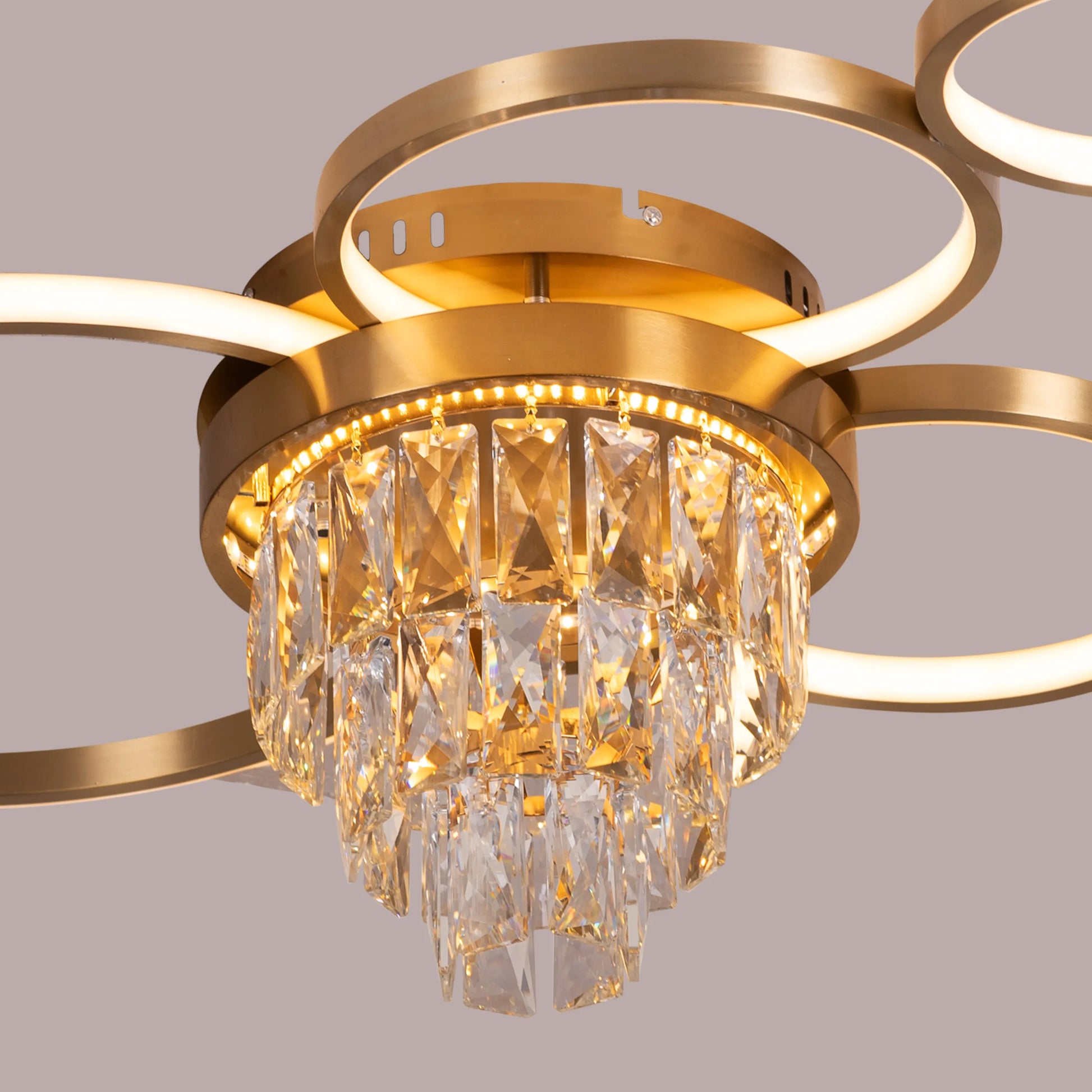 Crystal ceiling light with remote and gold accents.