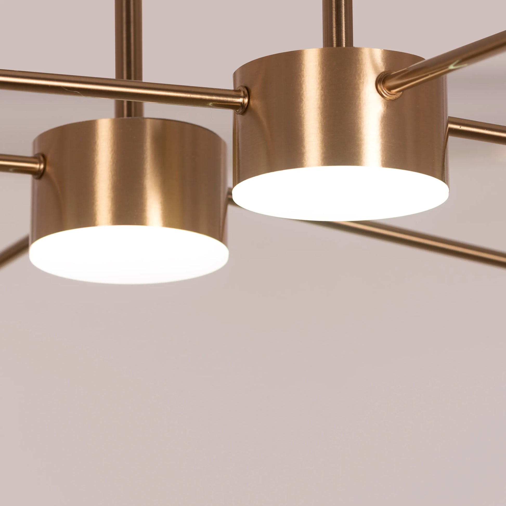 Walk On By Gold Ceiling Chandelier illuminating an elegant dining room