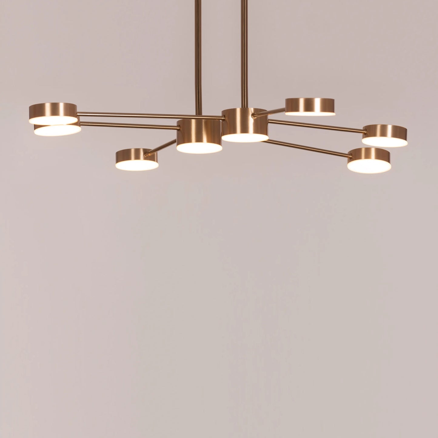 Walk On By Gold Ceiling Chandelier illuminating an elegant dining room