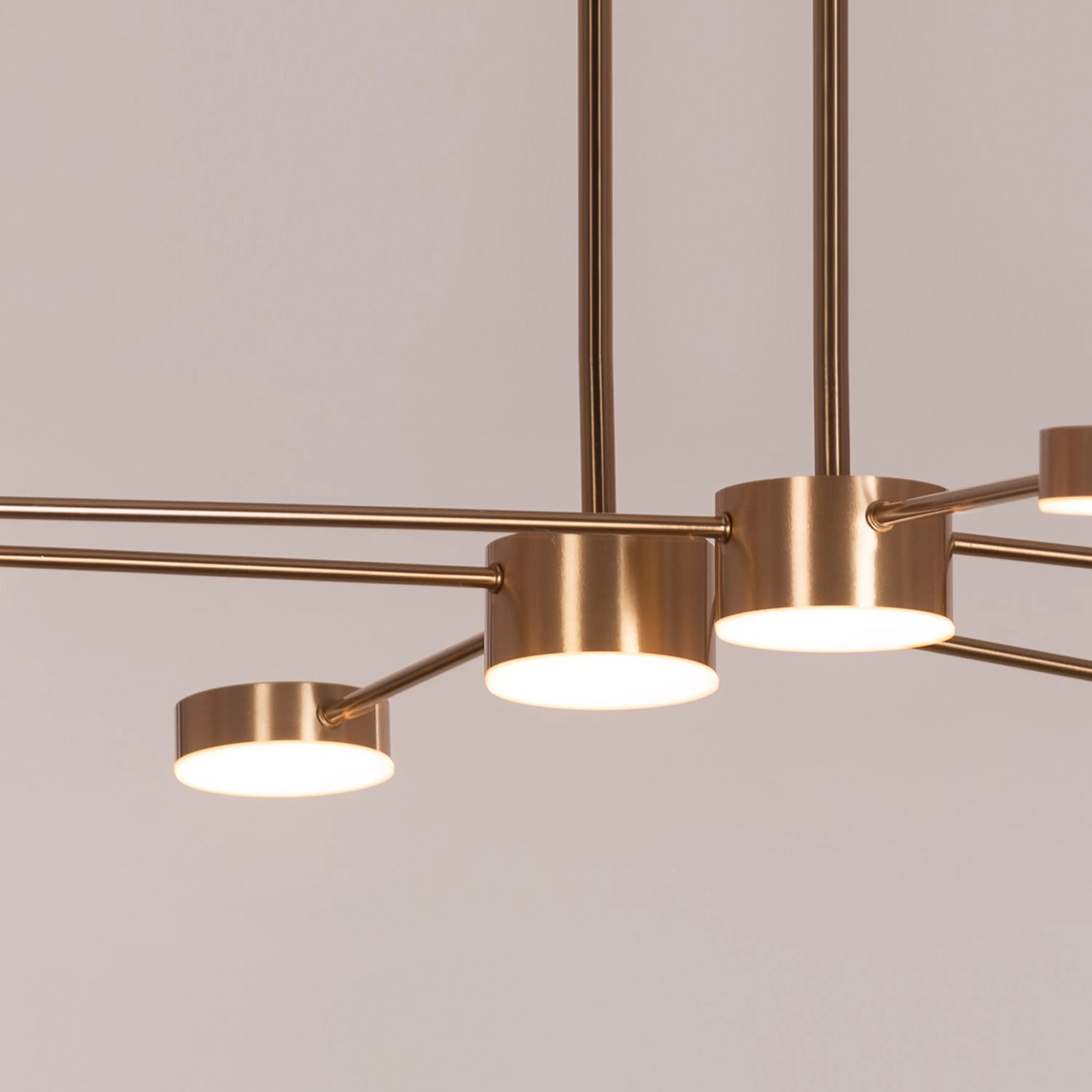 Walk On By Gold Ceiling Chandelier illuminating an elegant dining room