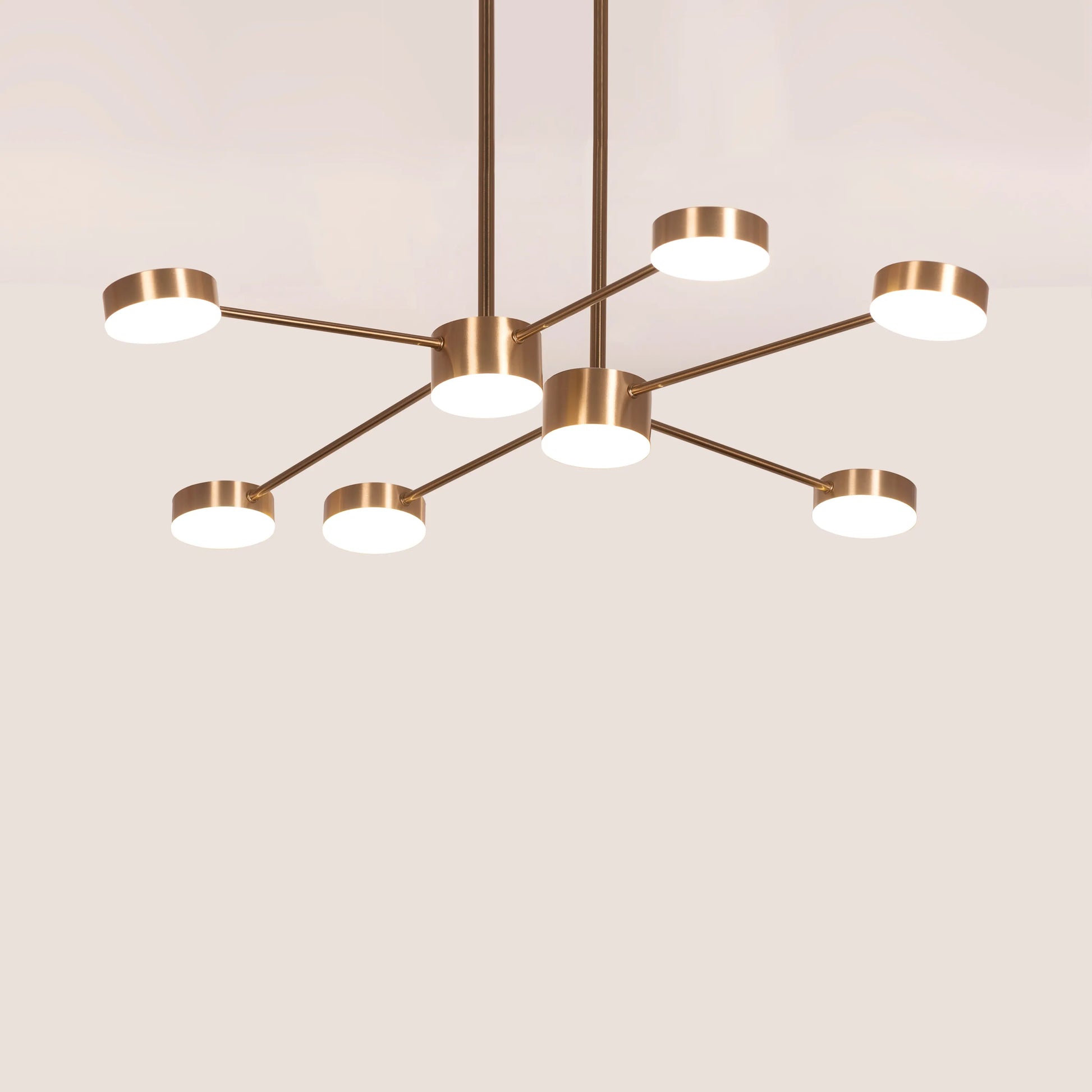 Walk On By Gold Ceiling Chandelier illuminating an elegant dining room