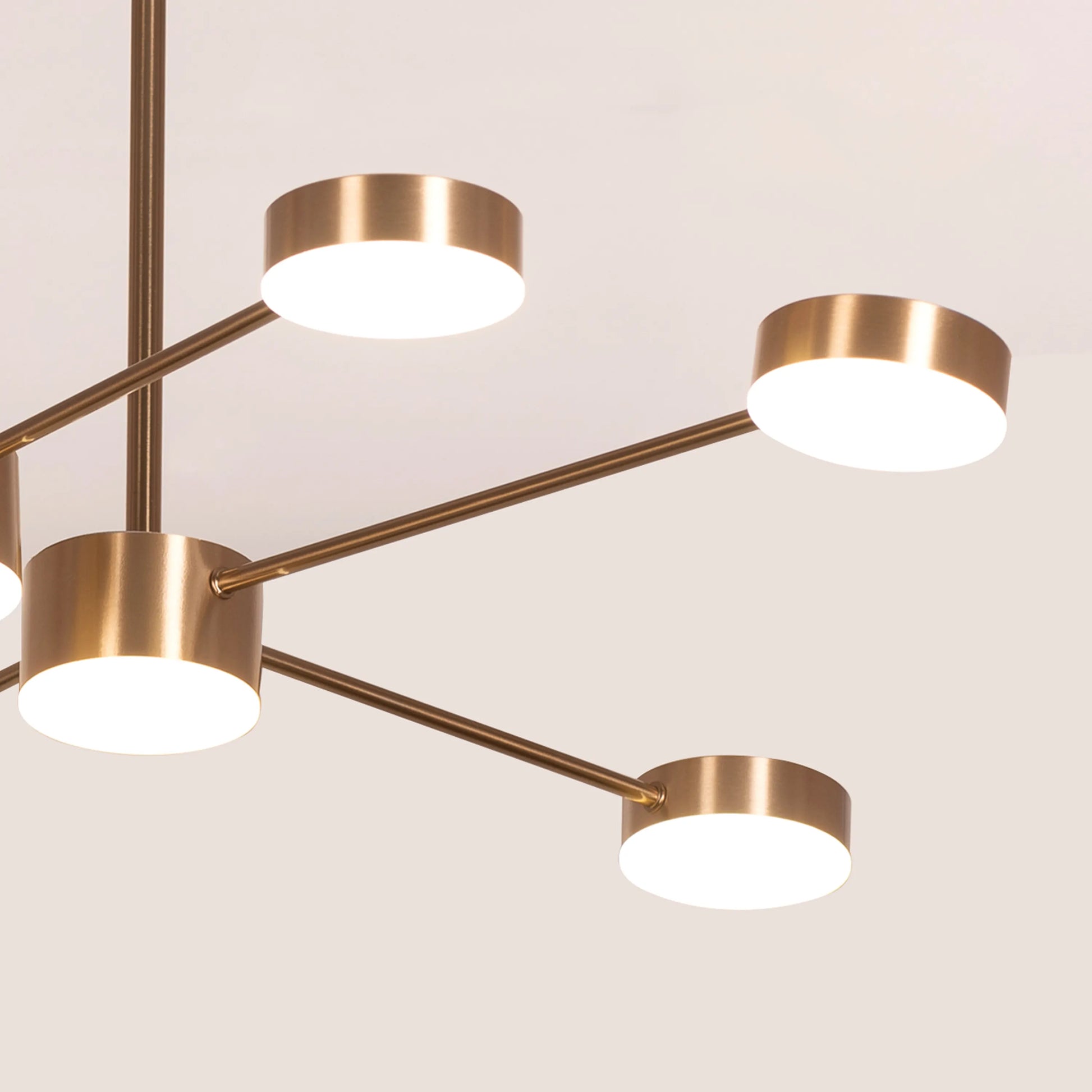 Walk On By Gold Ceiling Chandelier illuminating an elegant dining room