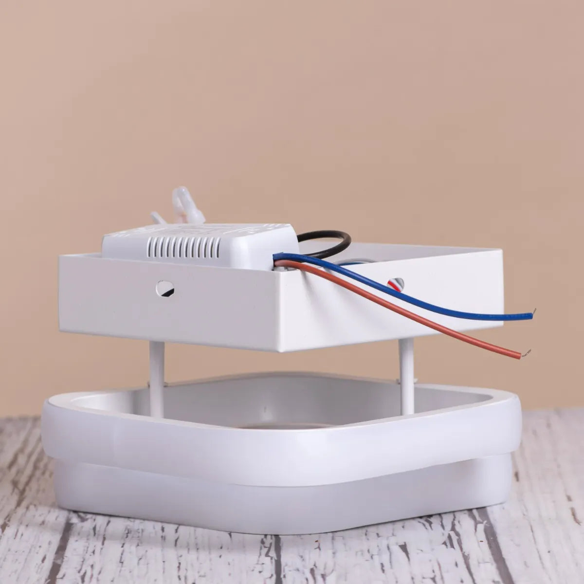 Contemporary ceiling light featuring white finish and dimmable options.