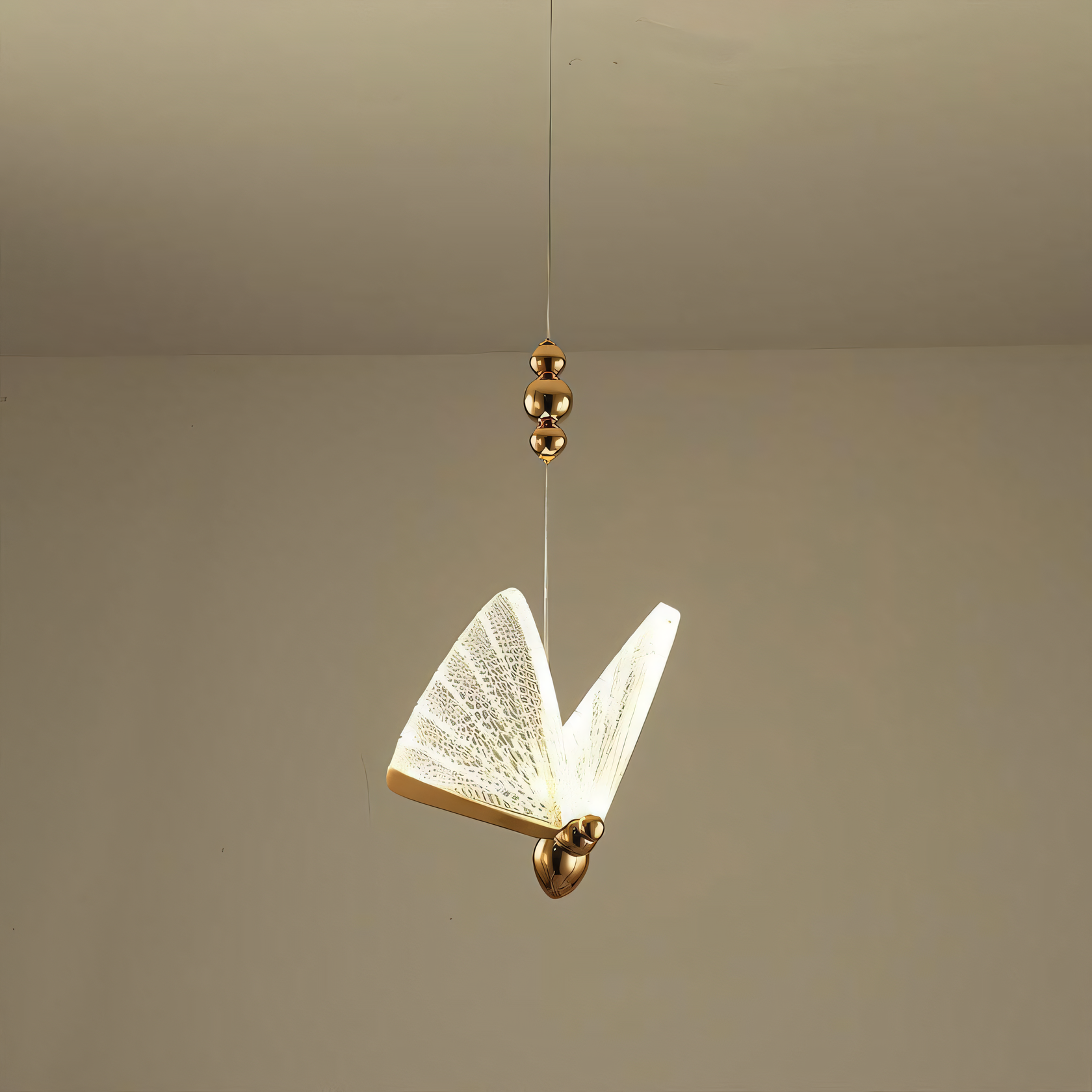 Delicate and graceful hanging light fixture with a butterfly design