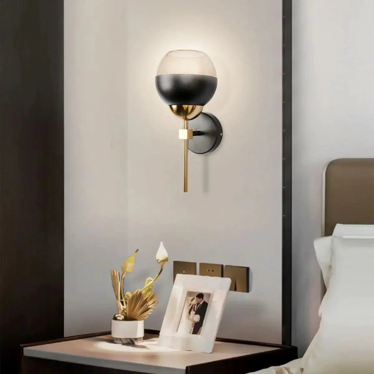 Intricate metalwork wall light design