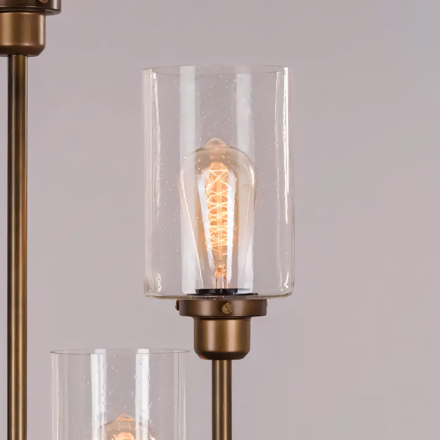 Flecked glass hurricanes add visual interest to floor lamp