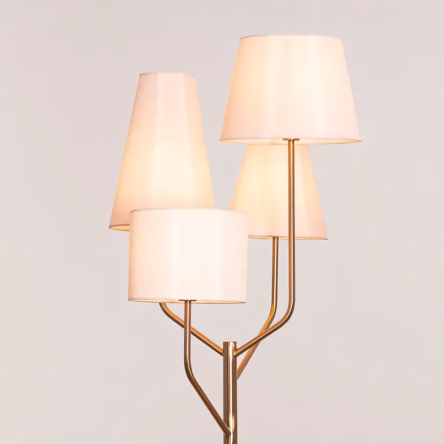 Warm and inviting ambiance created by gold floor lamp