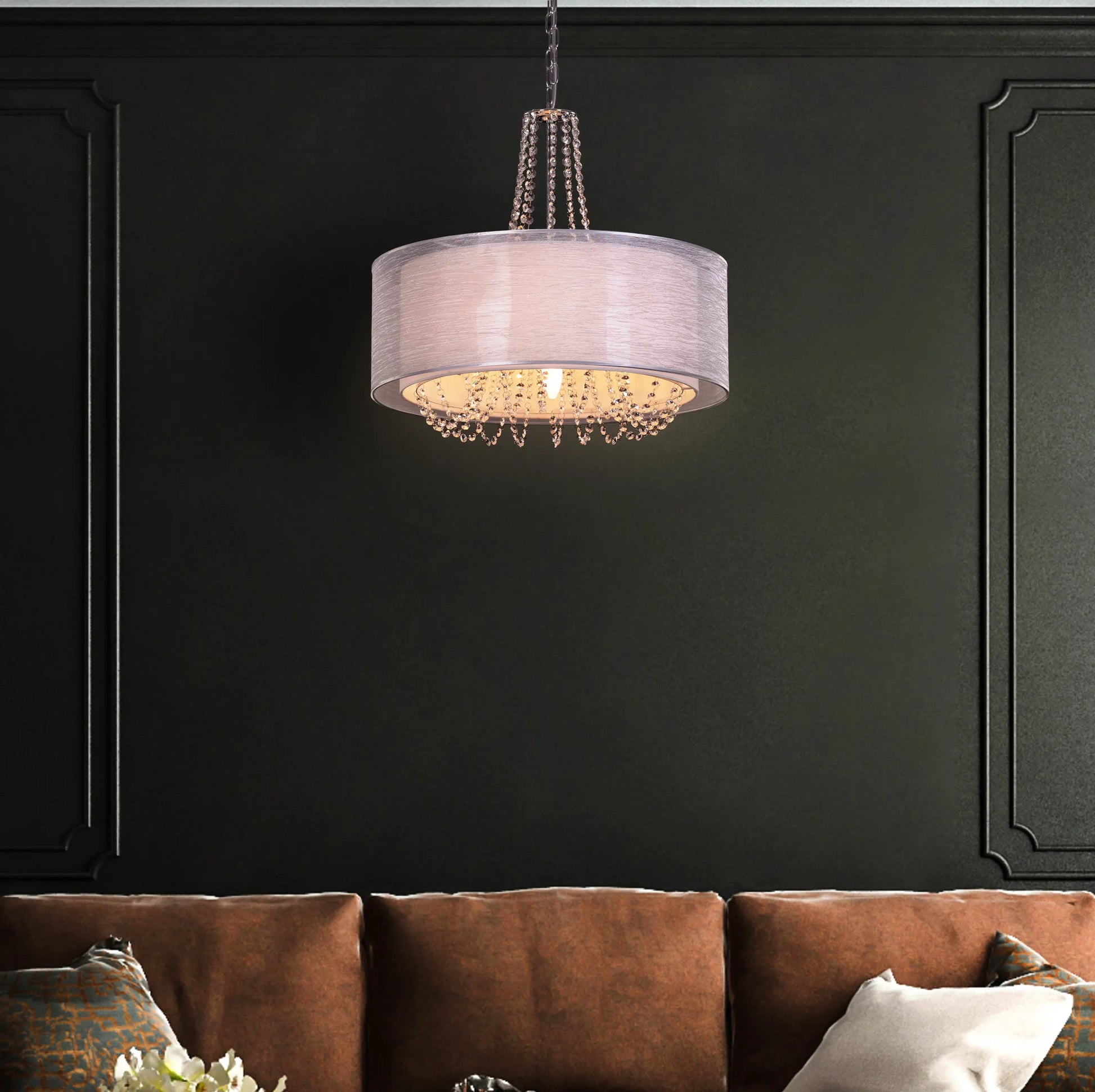 Gorgeous Girl crystal chandelier illuminating a lavish dining room.